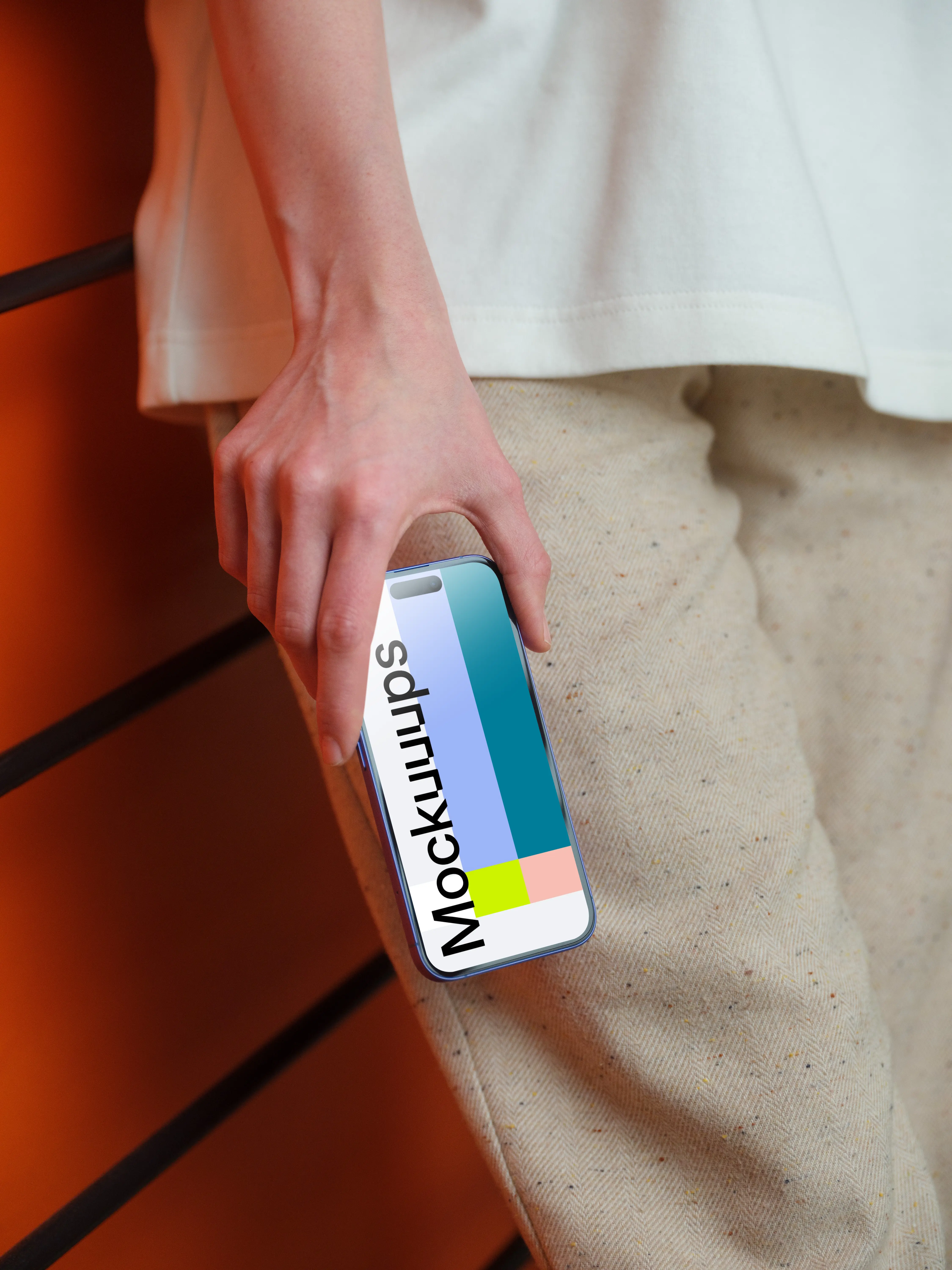 iPhone 16 mockup in a casual setting