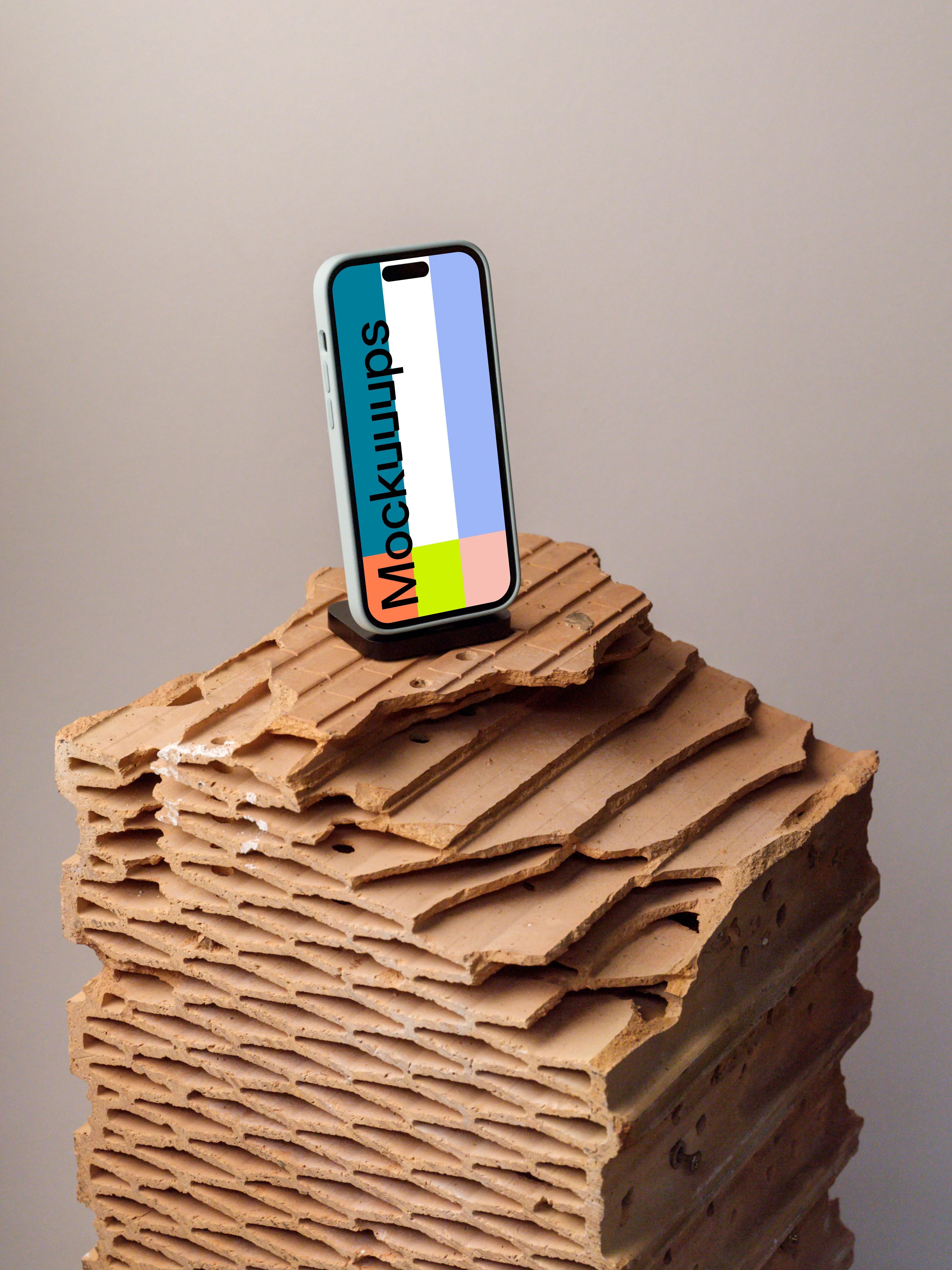 iPhone mockup on a brick