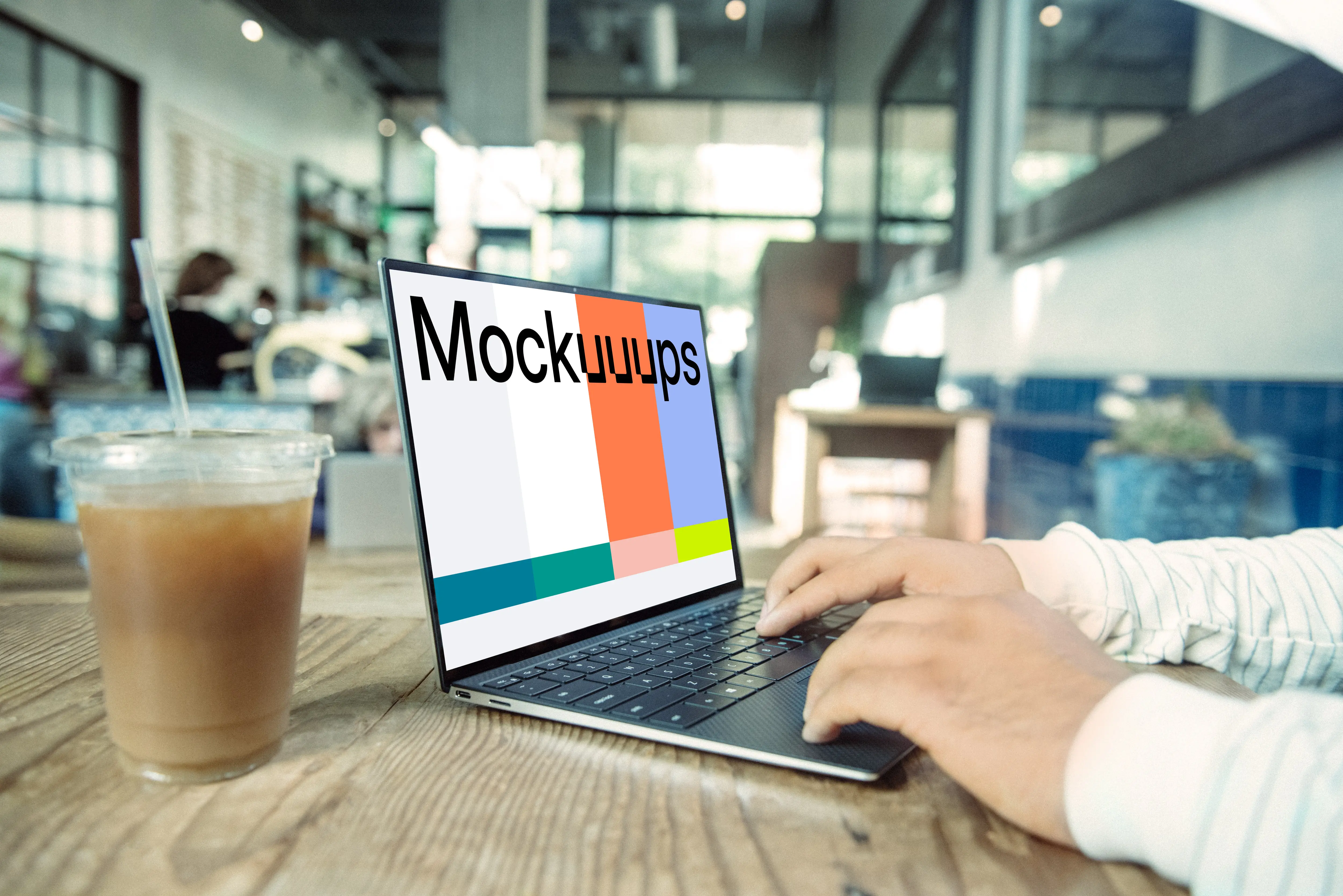 Dell XPS Mockup on table with drink at the side