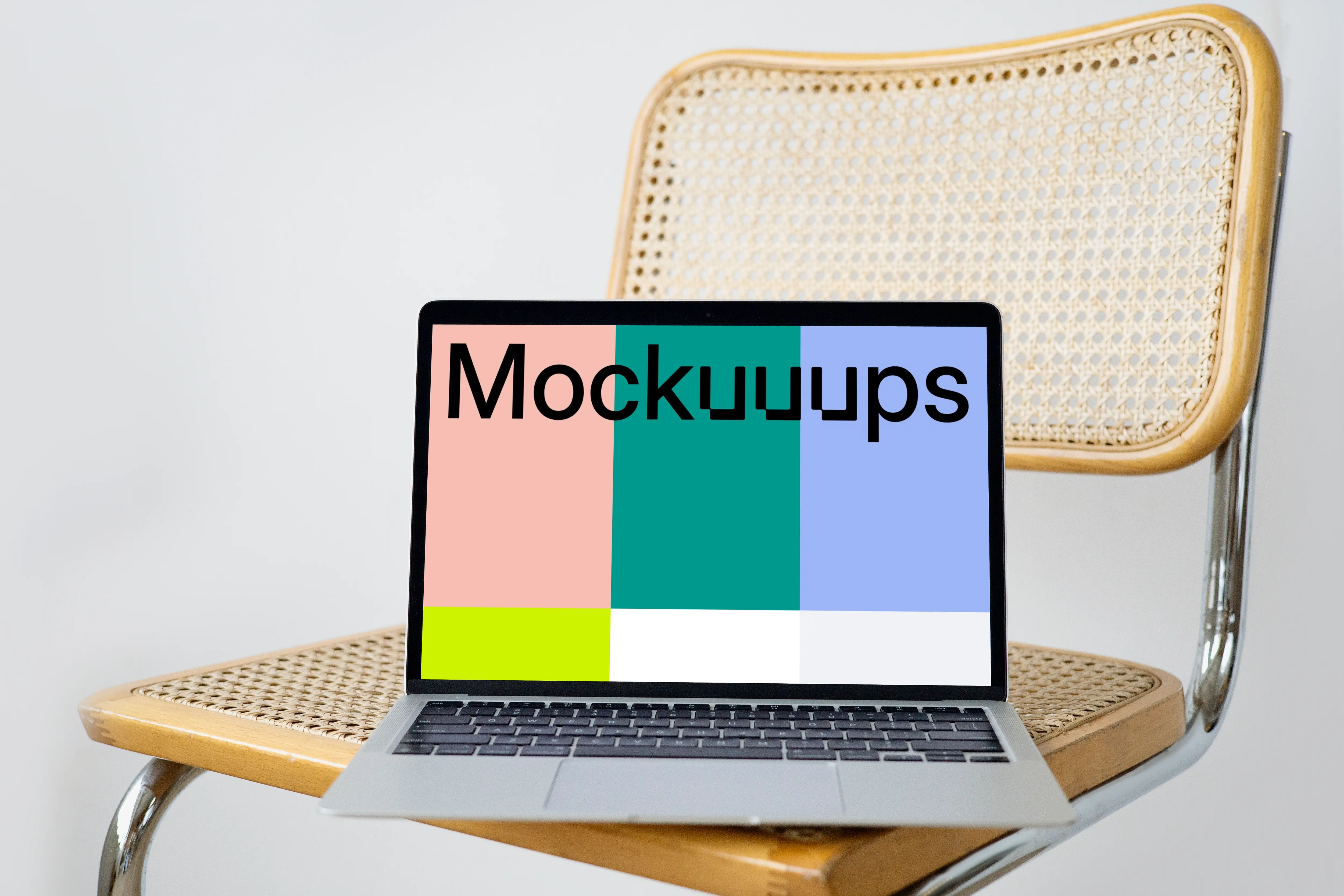 MacBook mockup on a chair 