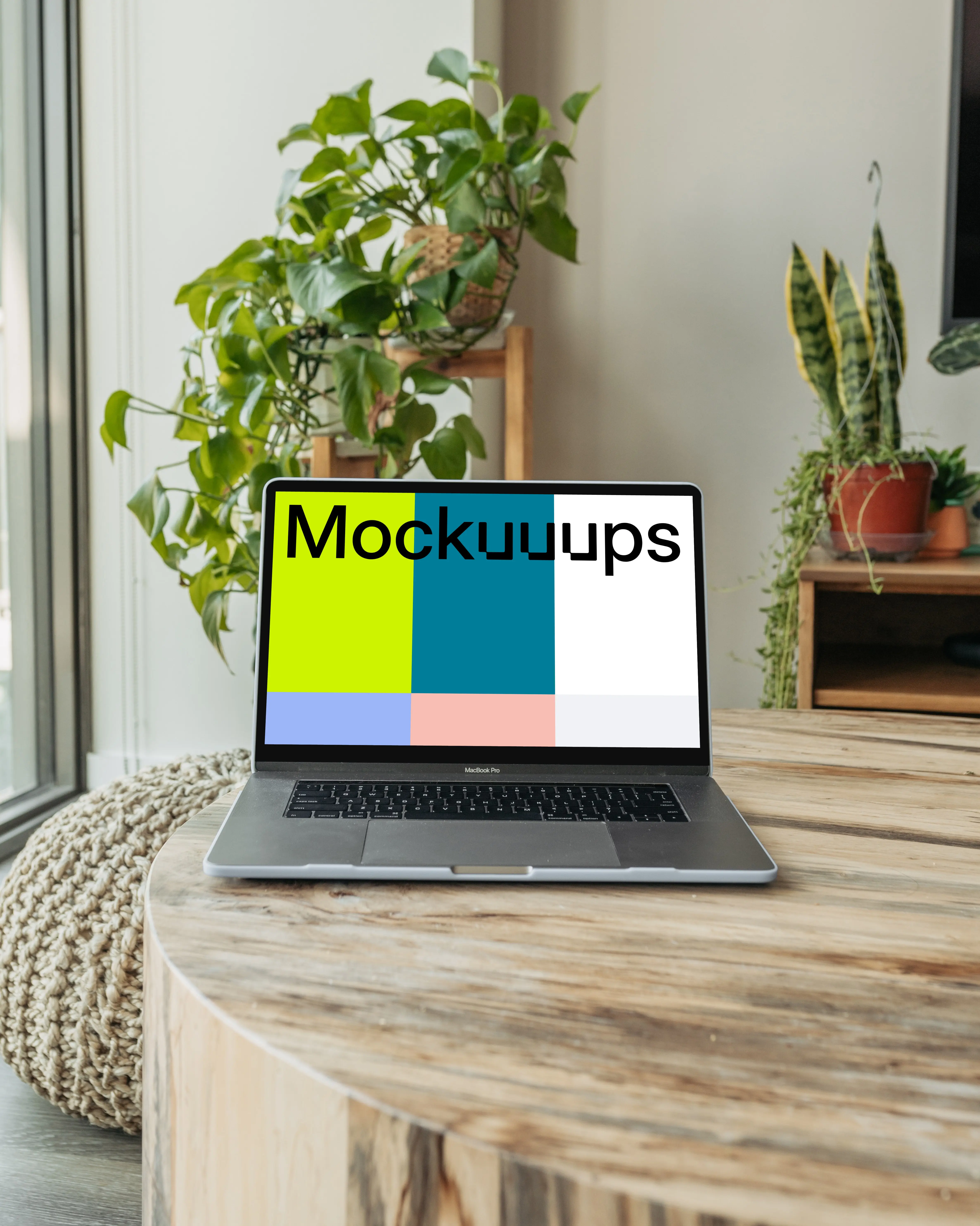 MacBook Pro mockup on a wooden table