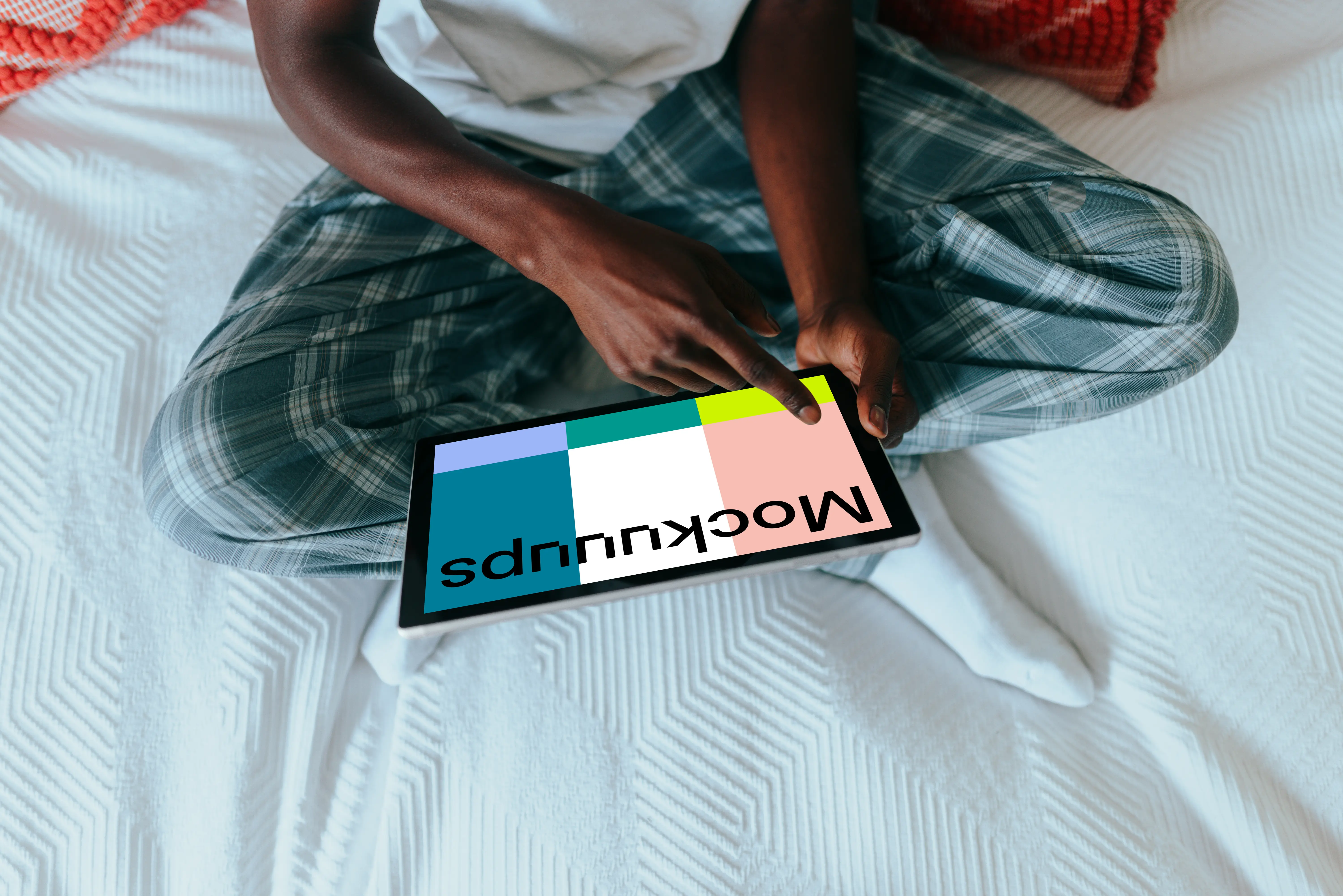 Microsoft Surface mockup held by a lady on her bed