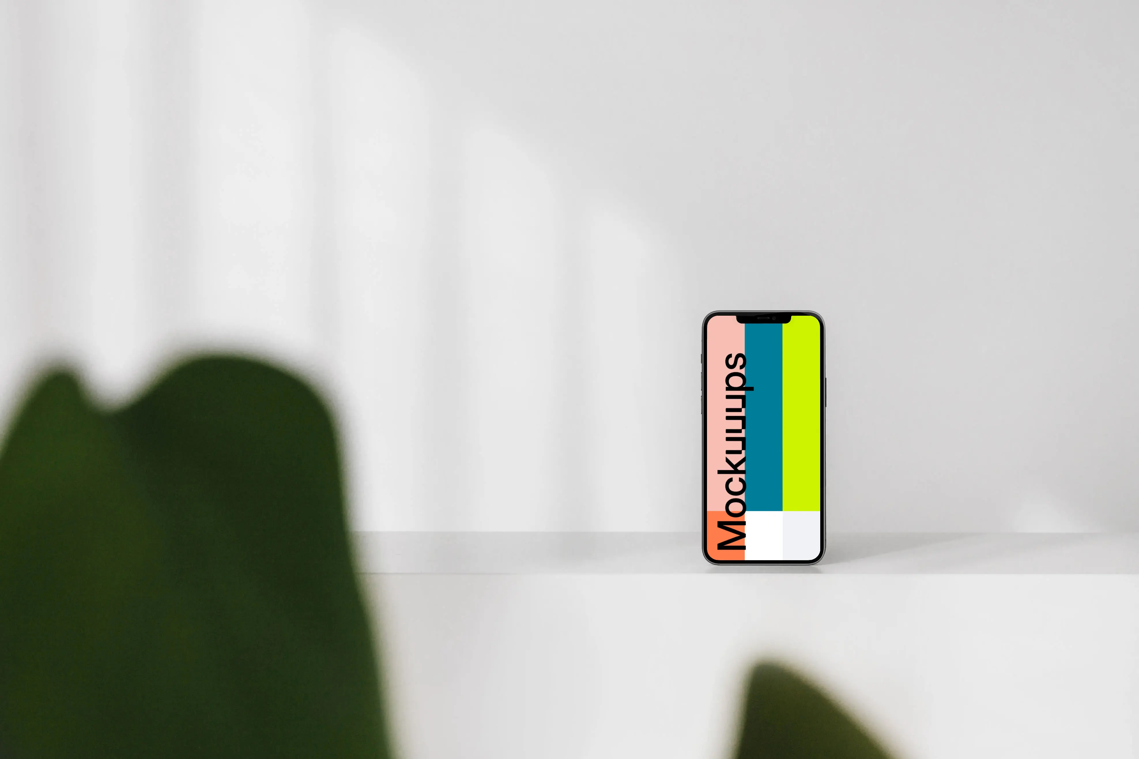 Minimal iPhone mockup on a white wall 