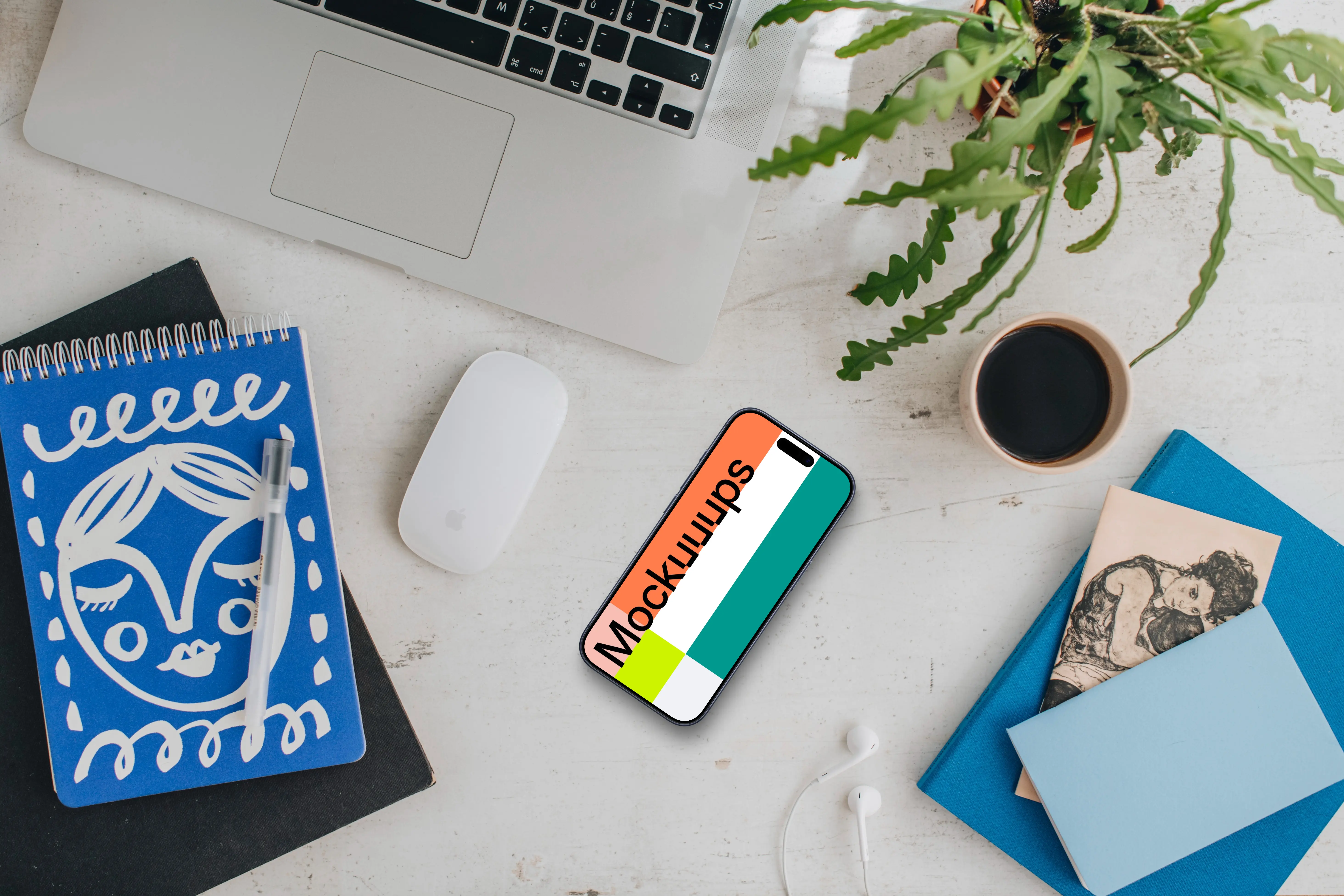 Free mockup of smartphone device with a MacBook on the side