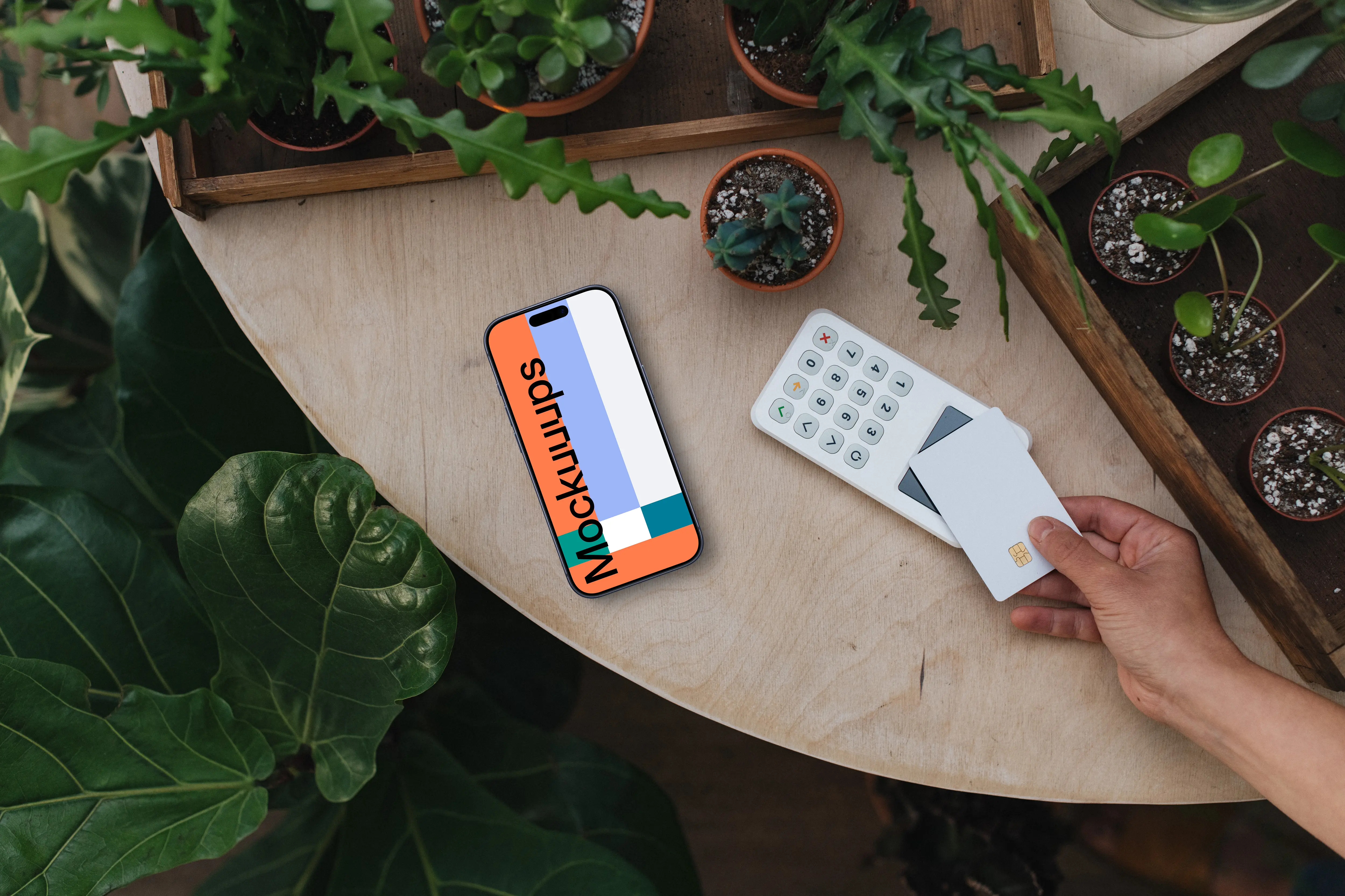 Person paying, botanical surrounding and an iPhone mockup