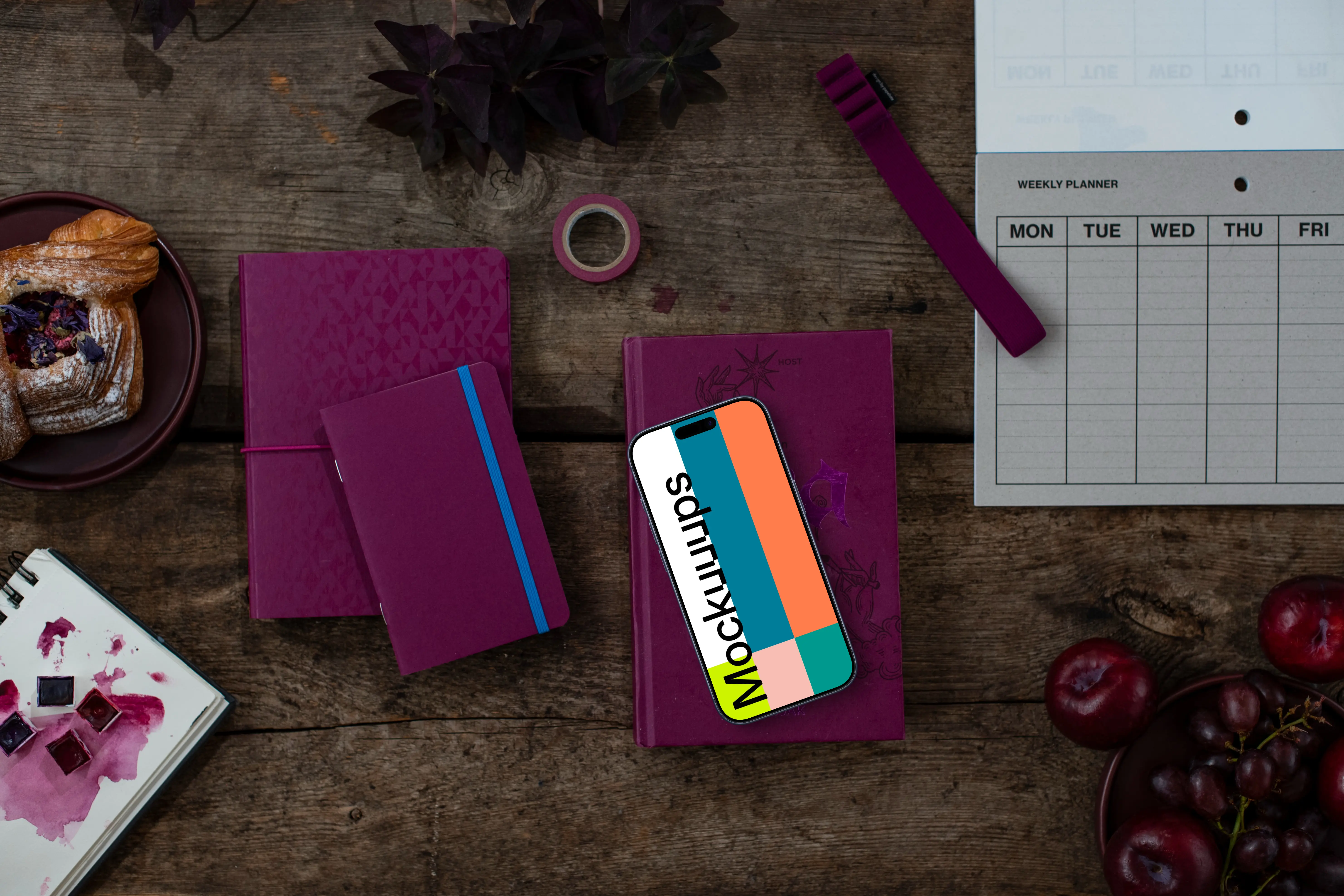 Phone on top of the book in Viva Magenta color