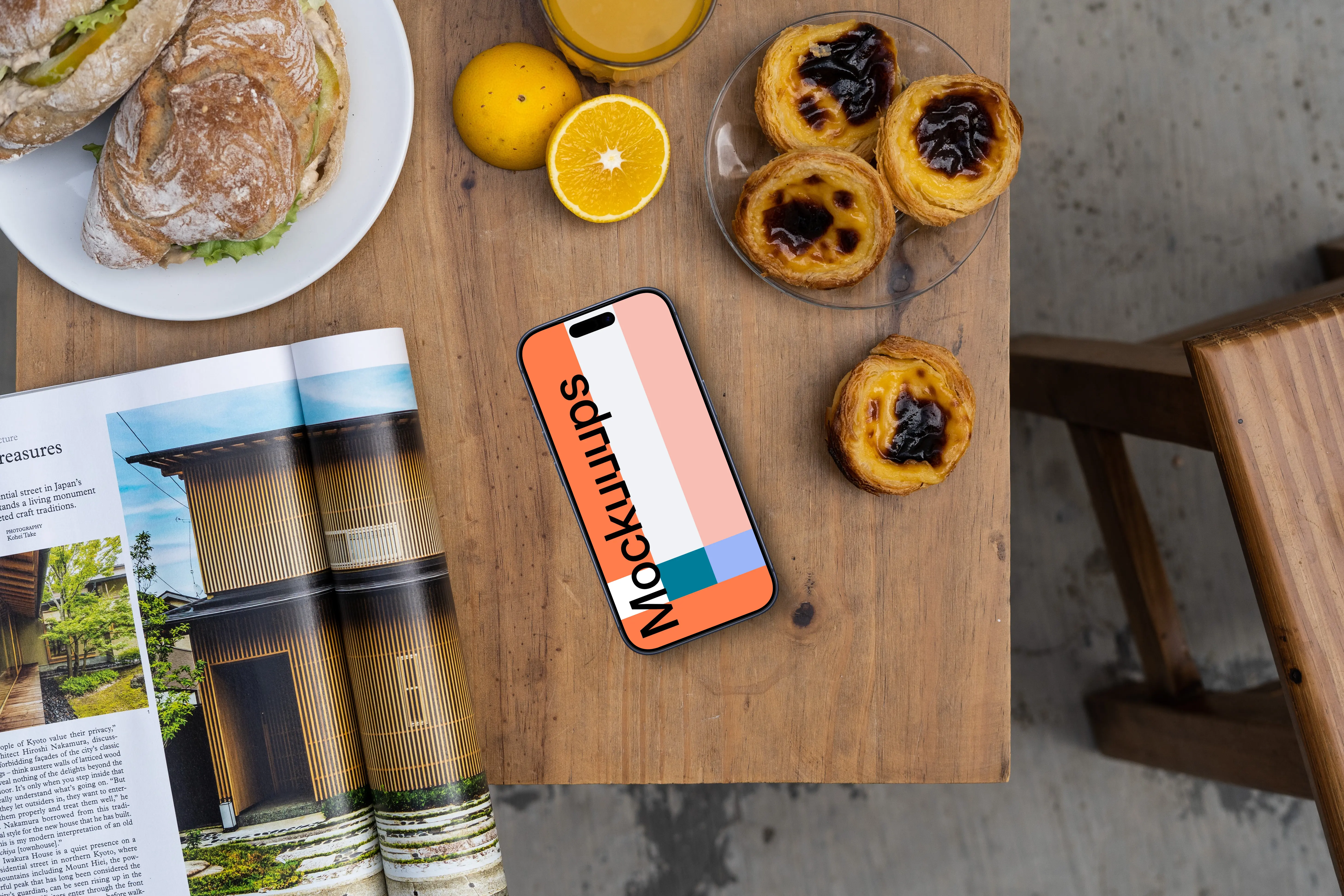Smartphone mockup in a cafe with pastries
