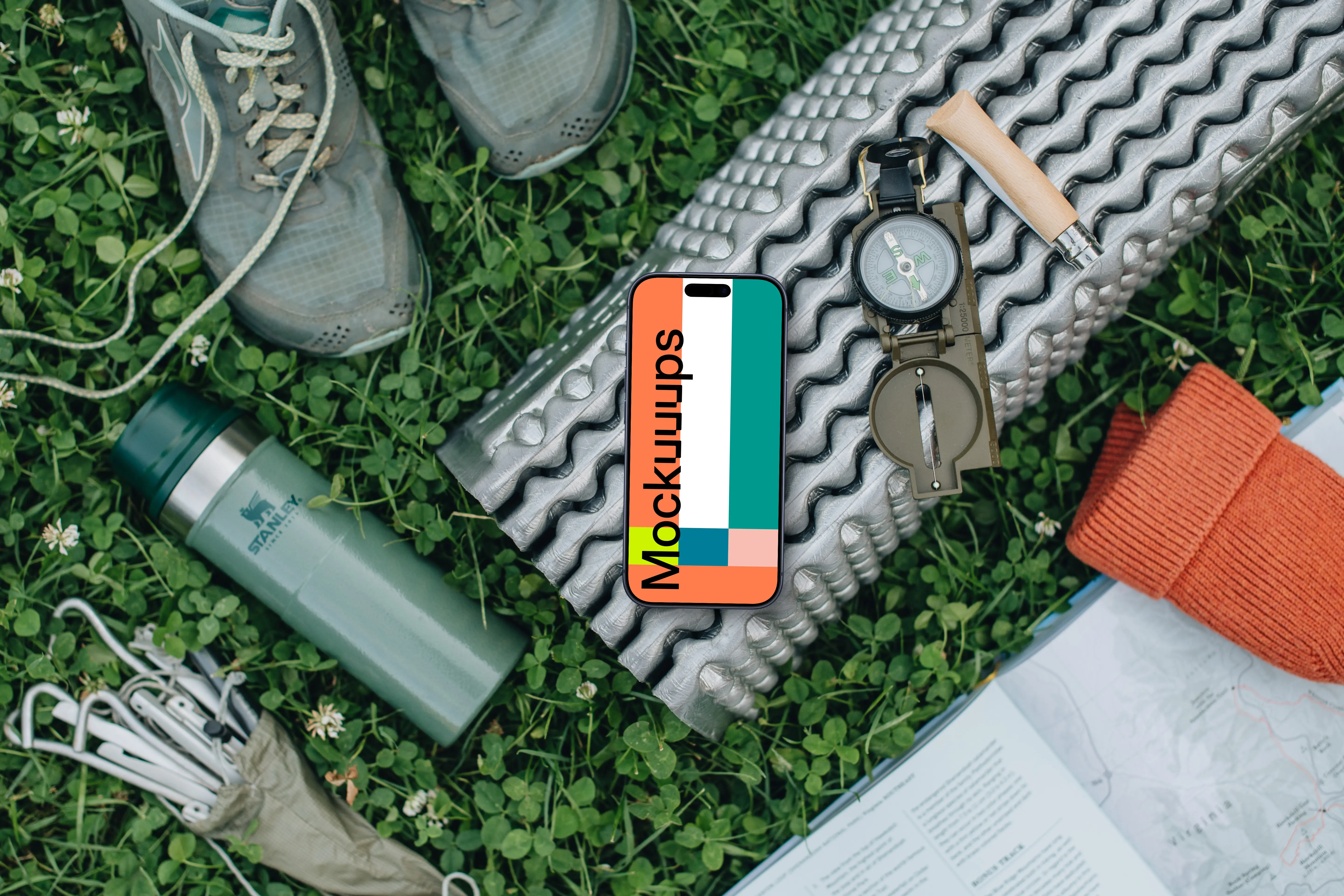 Smartphone mockup in a camp