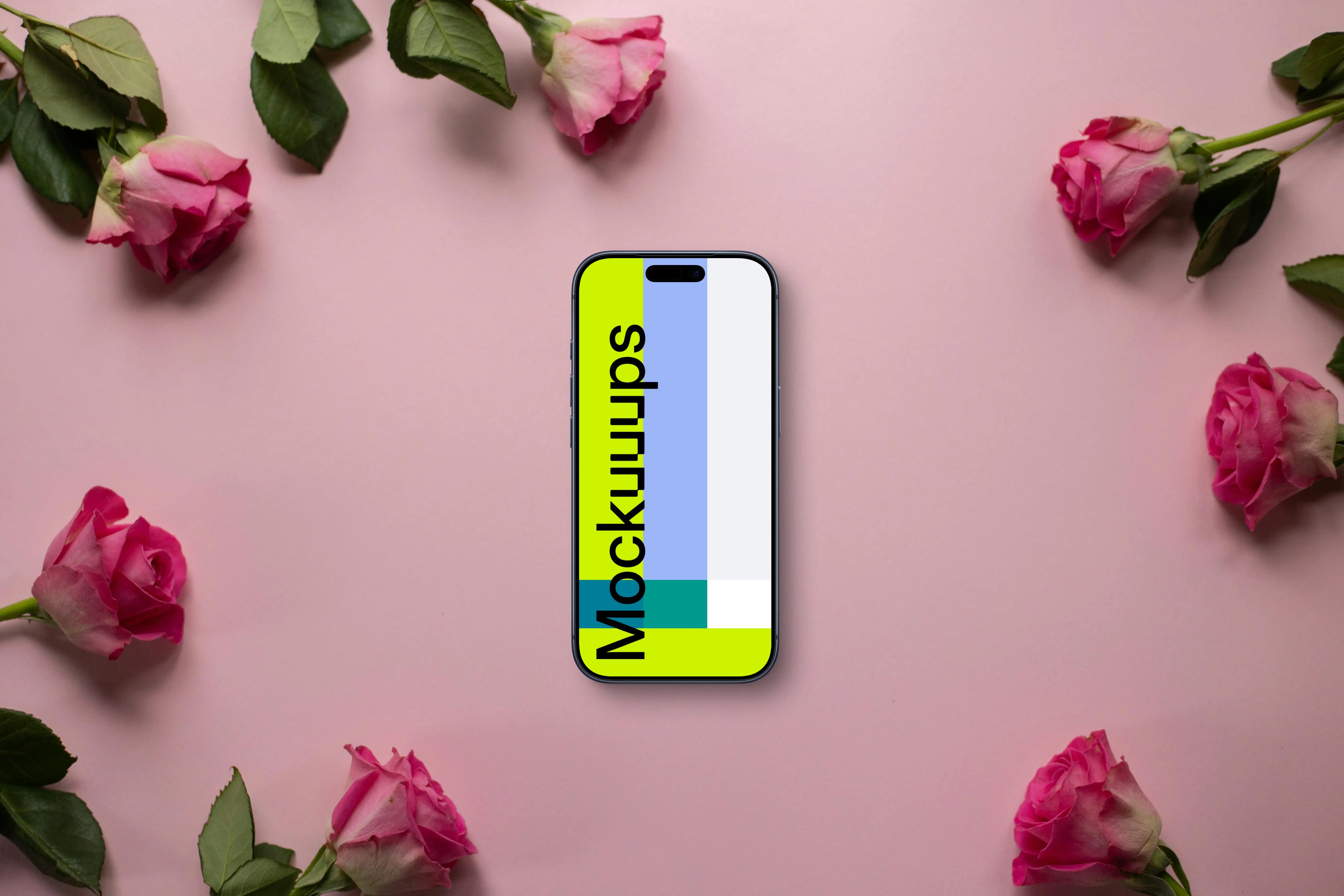 Smartphone mockup on a pink background among roses