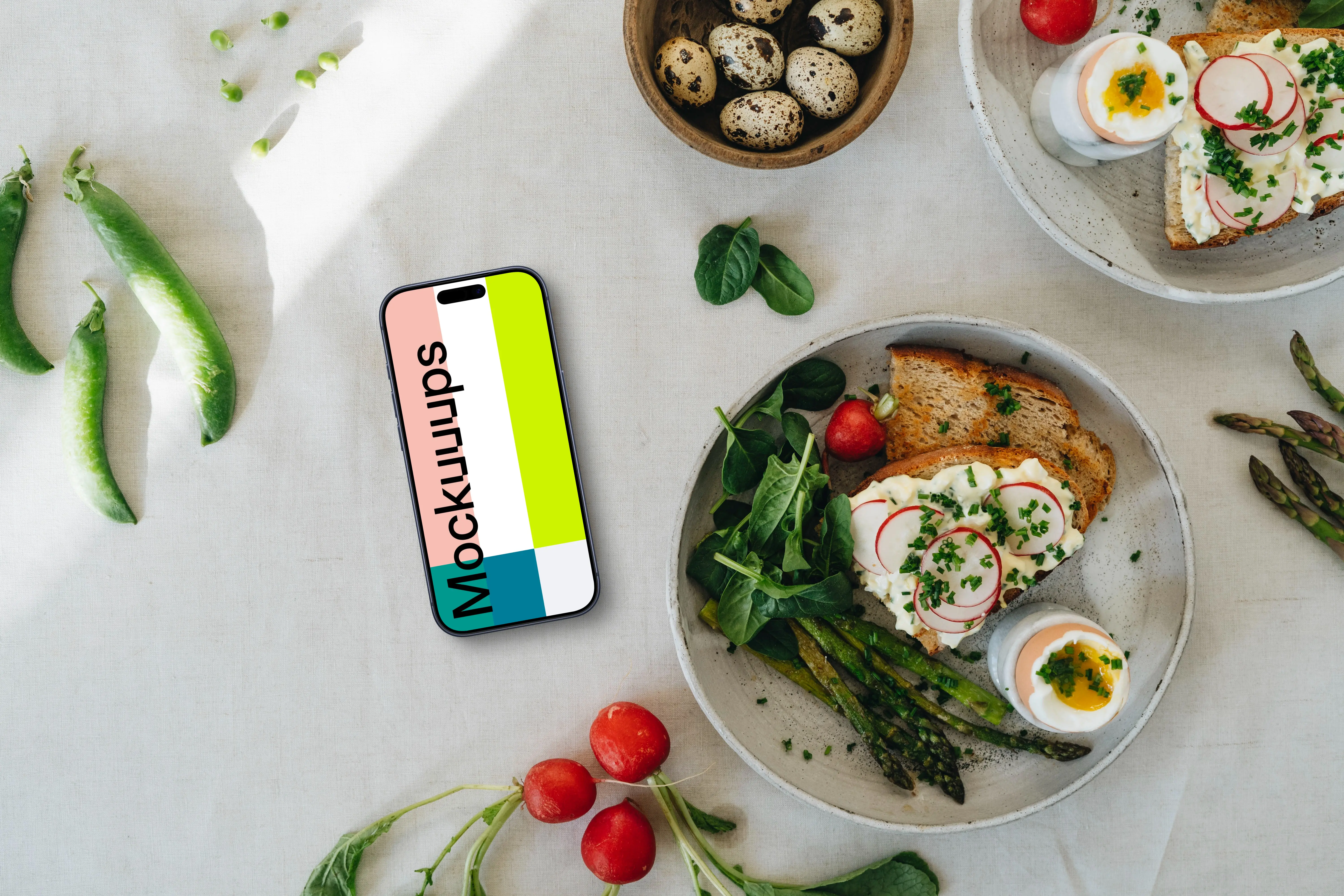 Smartphone mockup on a table with an Easter meal