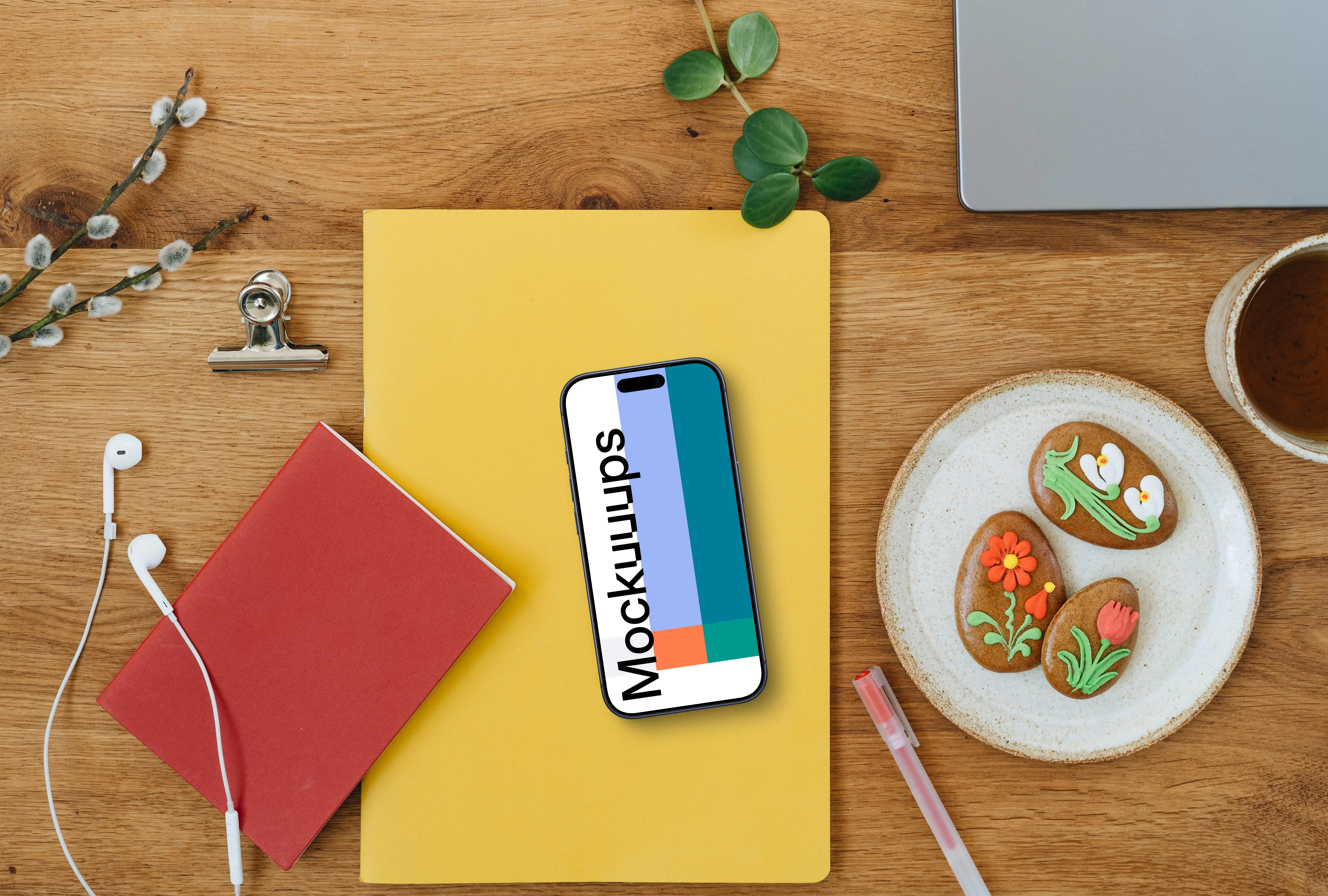 Smartphone mockup on a yellow notebook in an Easter settings