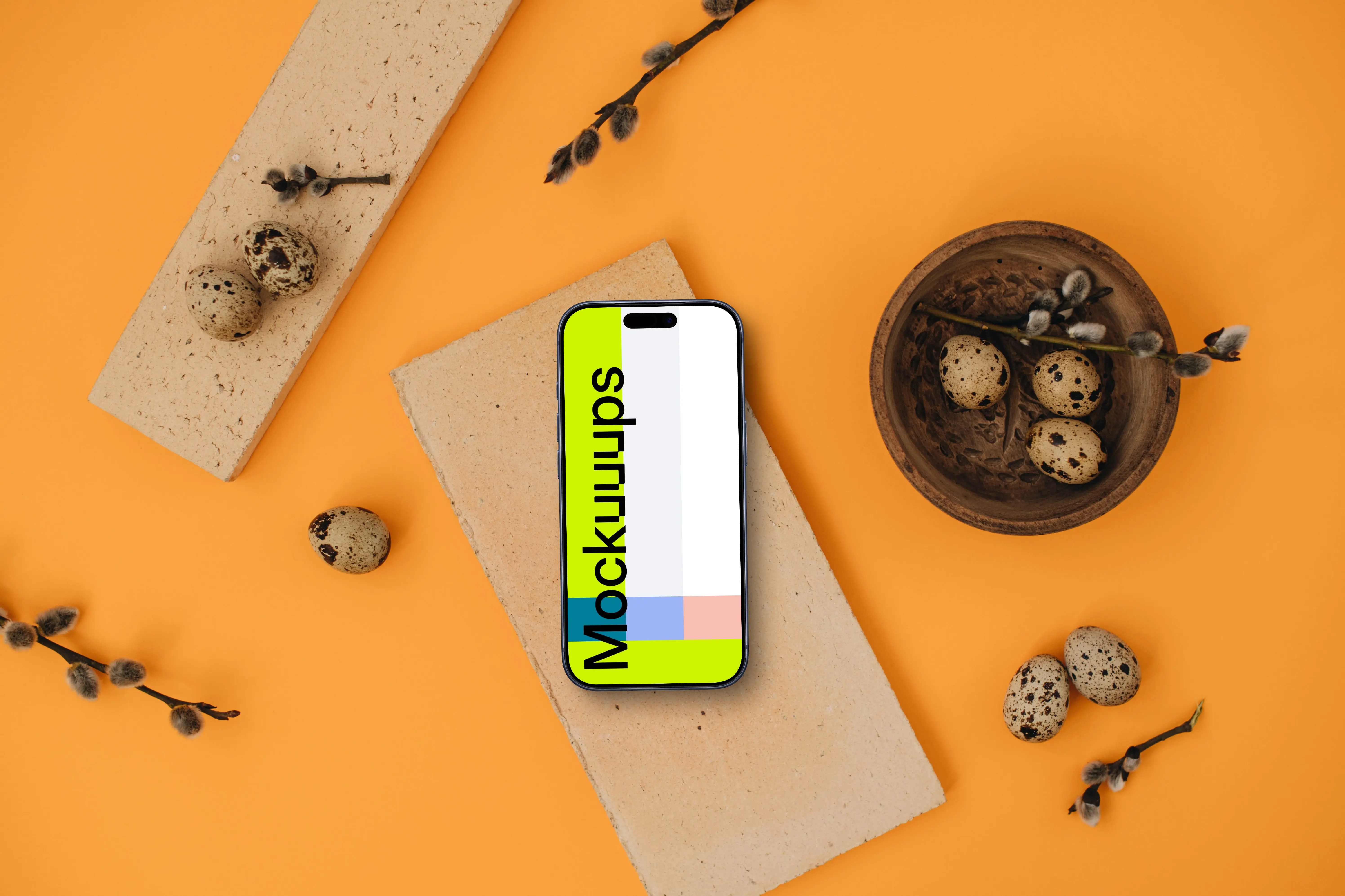 Smartphone mockup on an orange background with Easter decor