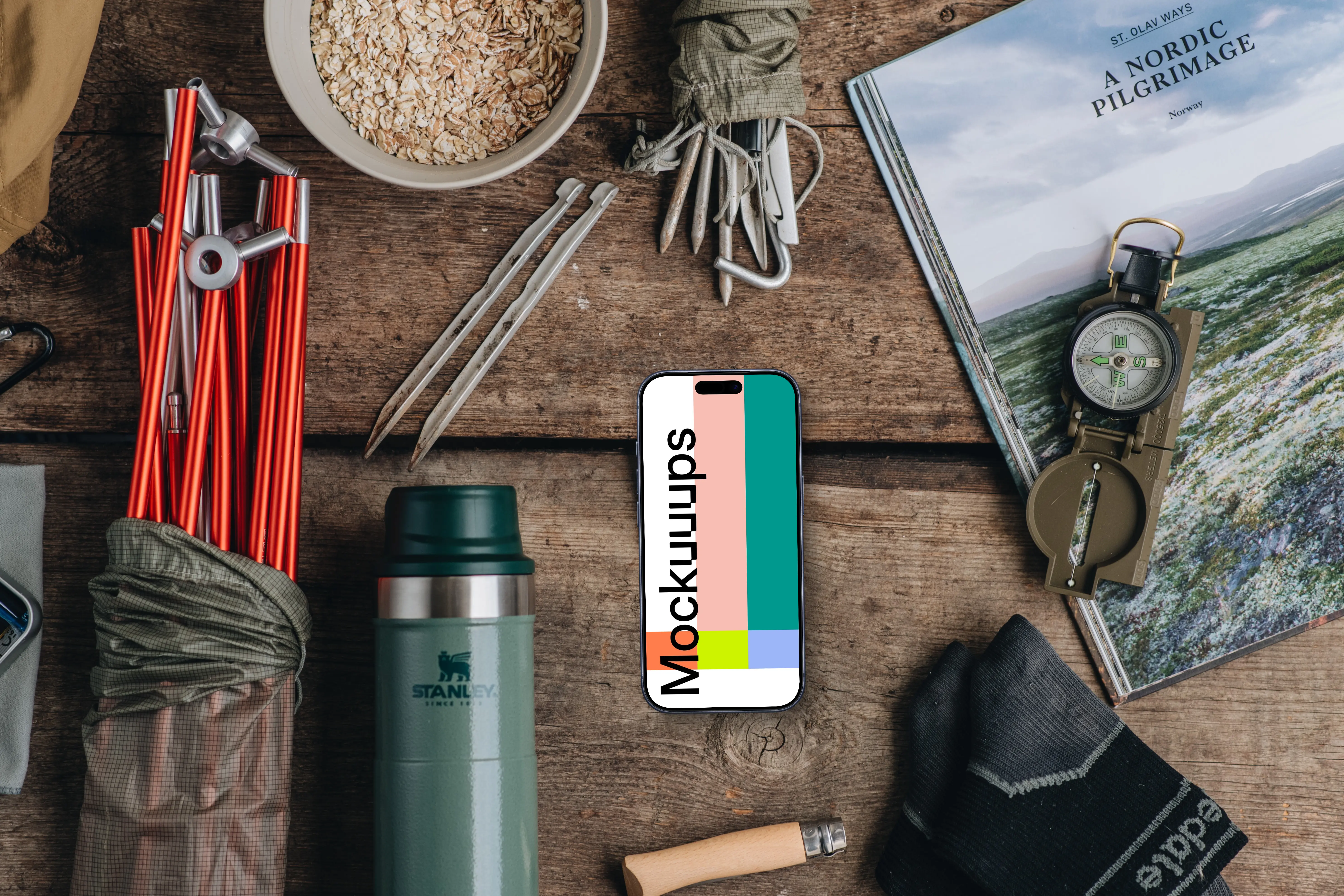 Smartphone mockup with camping supplies