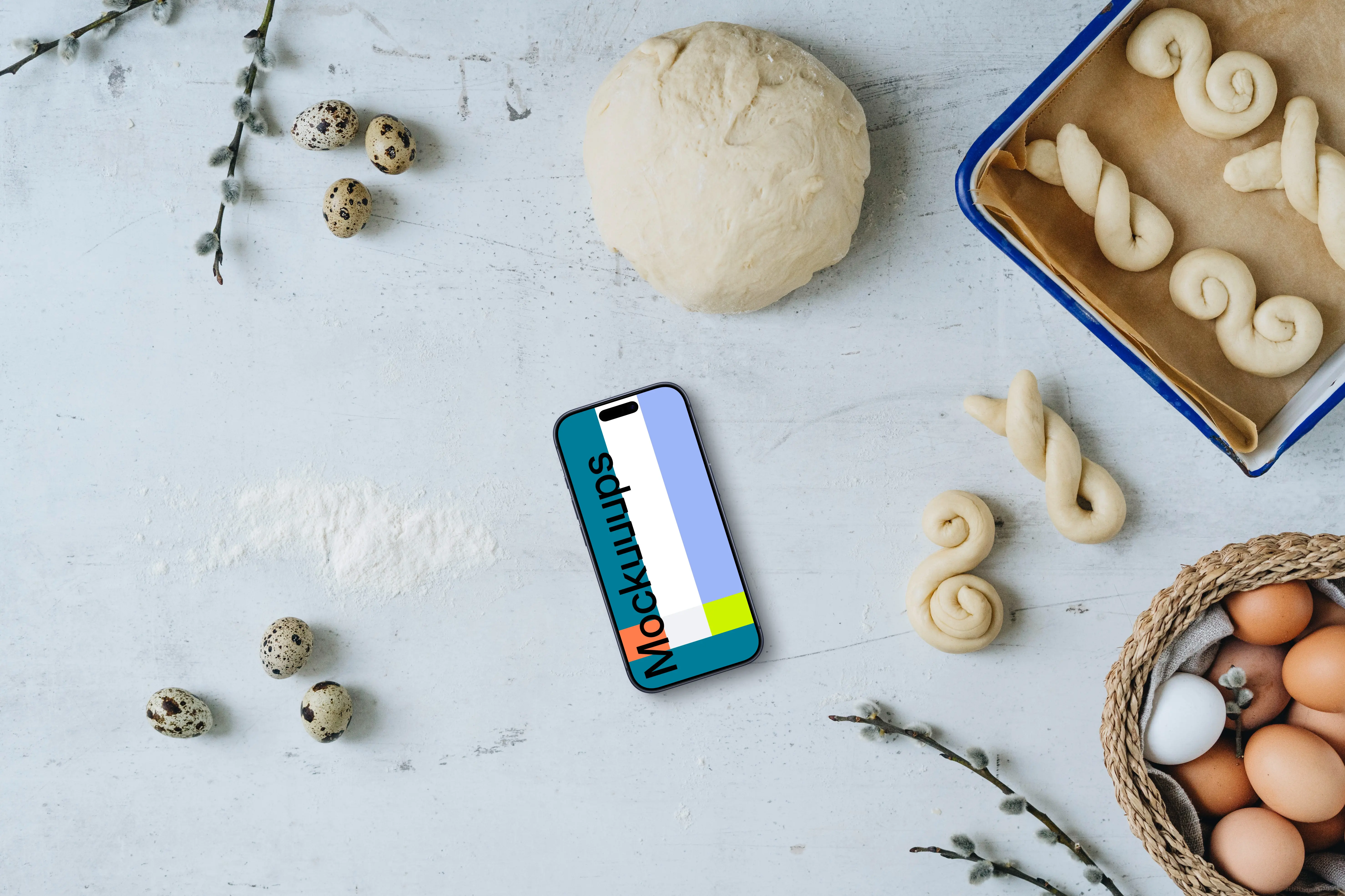Smartphone mockup with Easter pastries being made