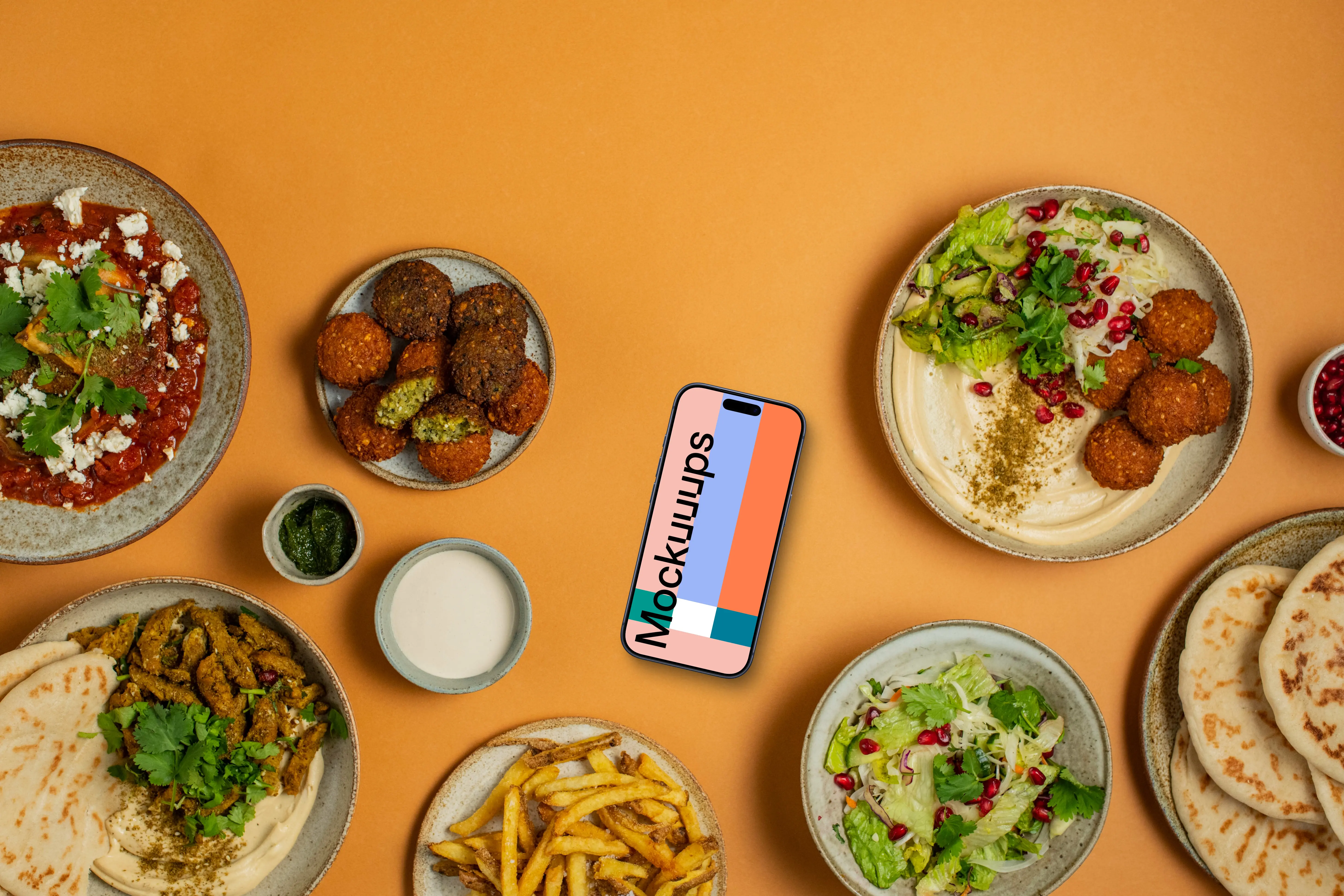 Smartphone mockup with Middle Eastern dishes