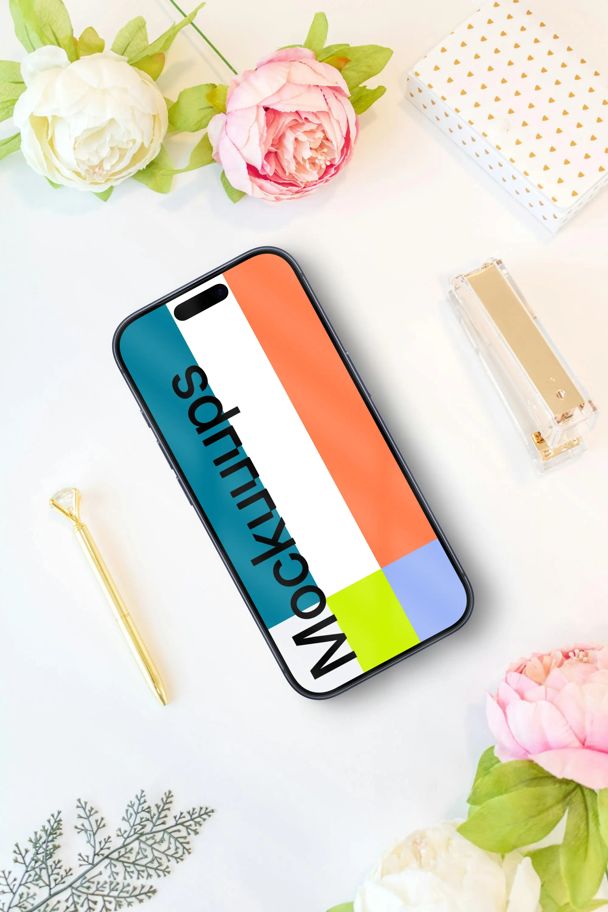 Smartphone with white and pink peonies and golden accessories