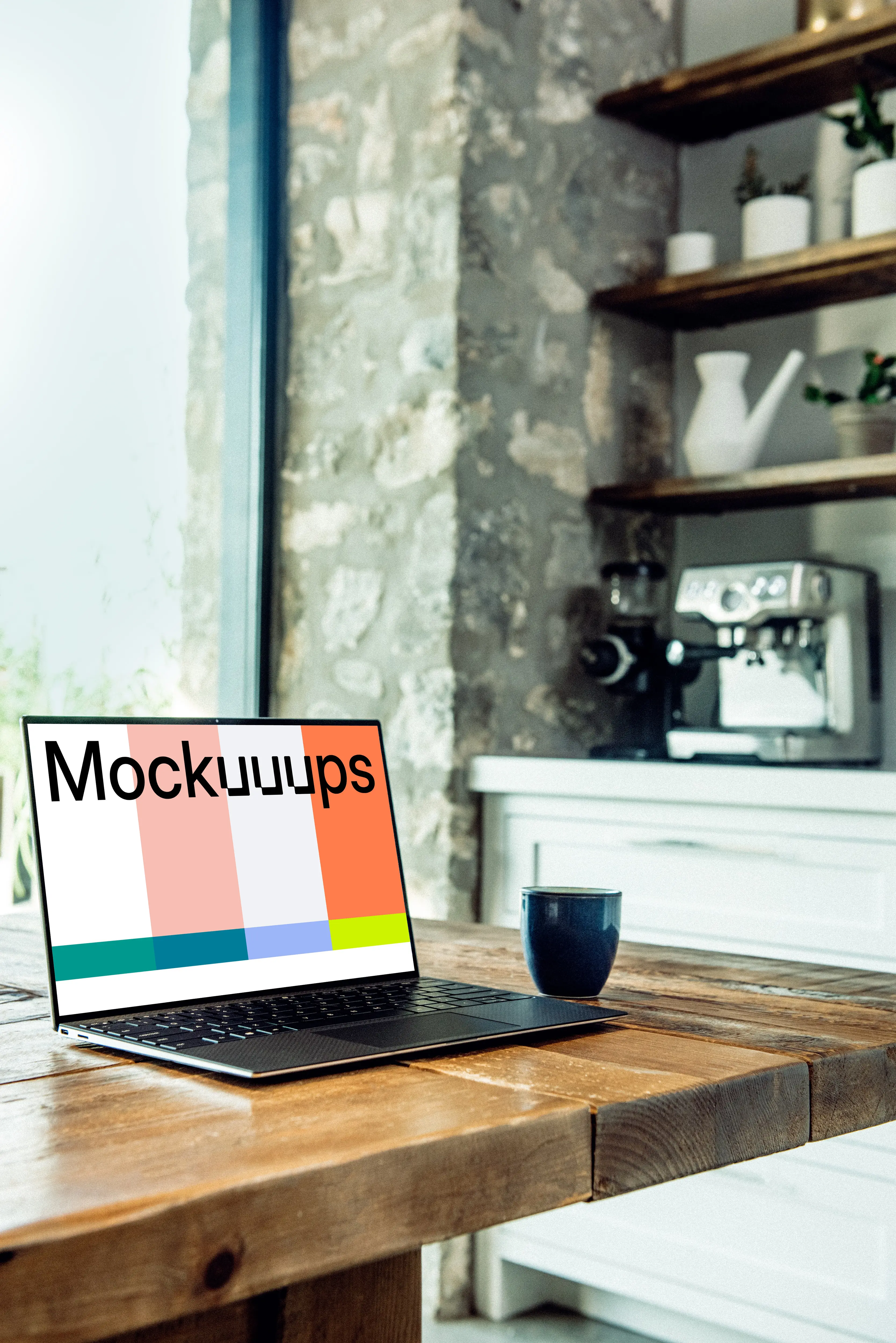 Dell XPS mockup on table with coffee mug at the side