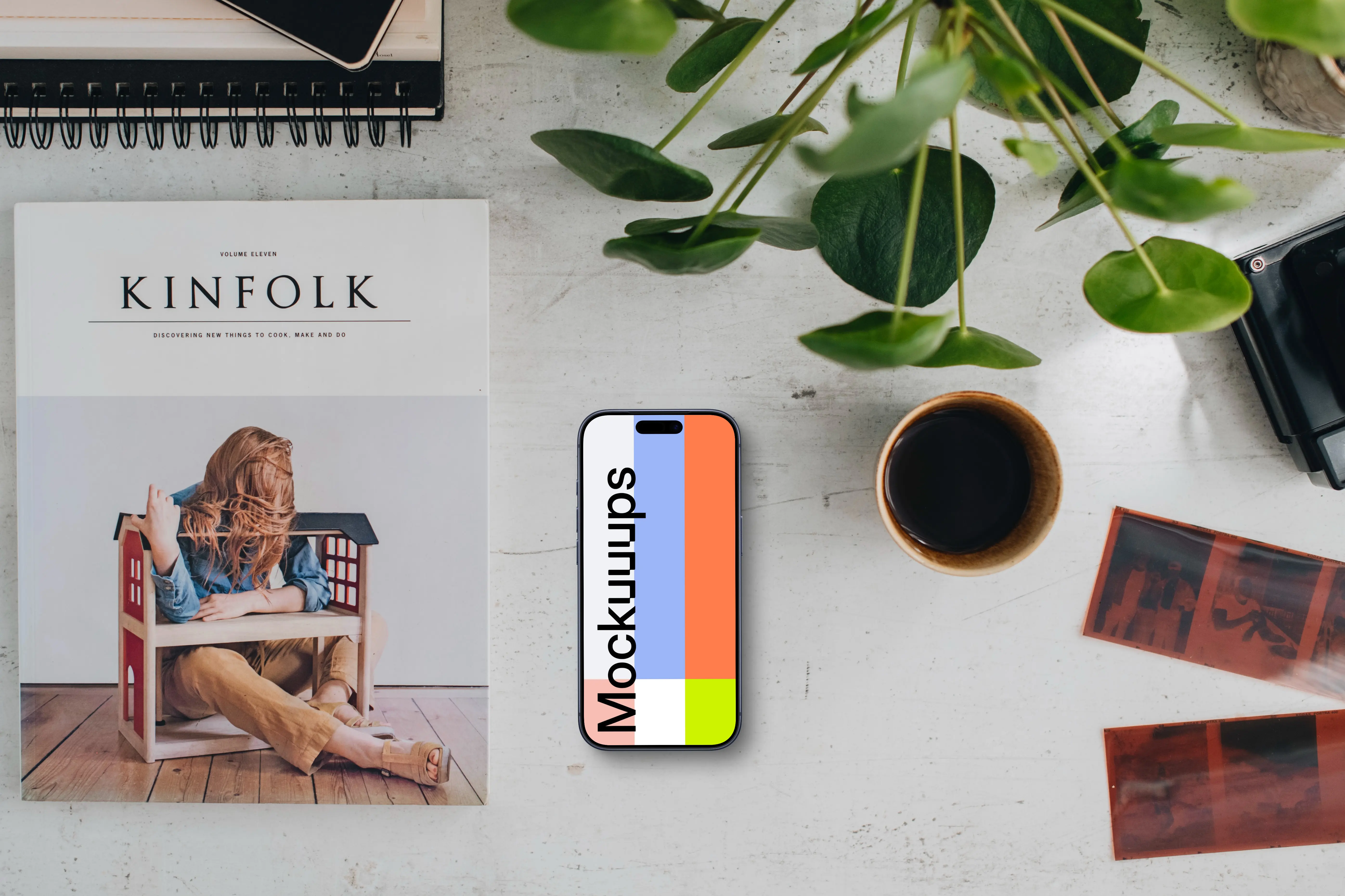 Top view of office desk with a phone mockup