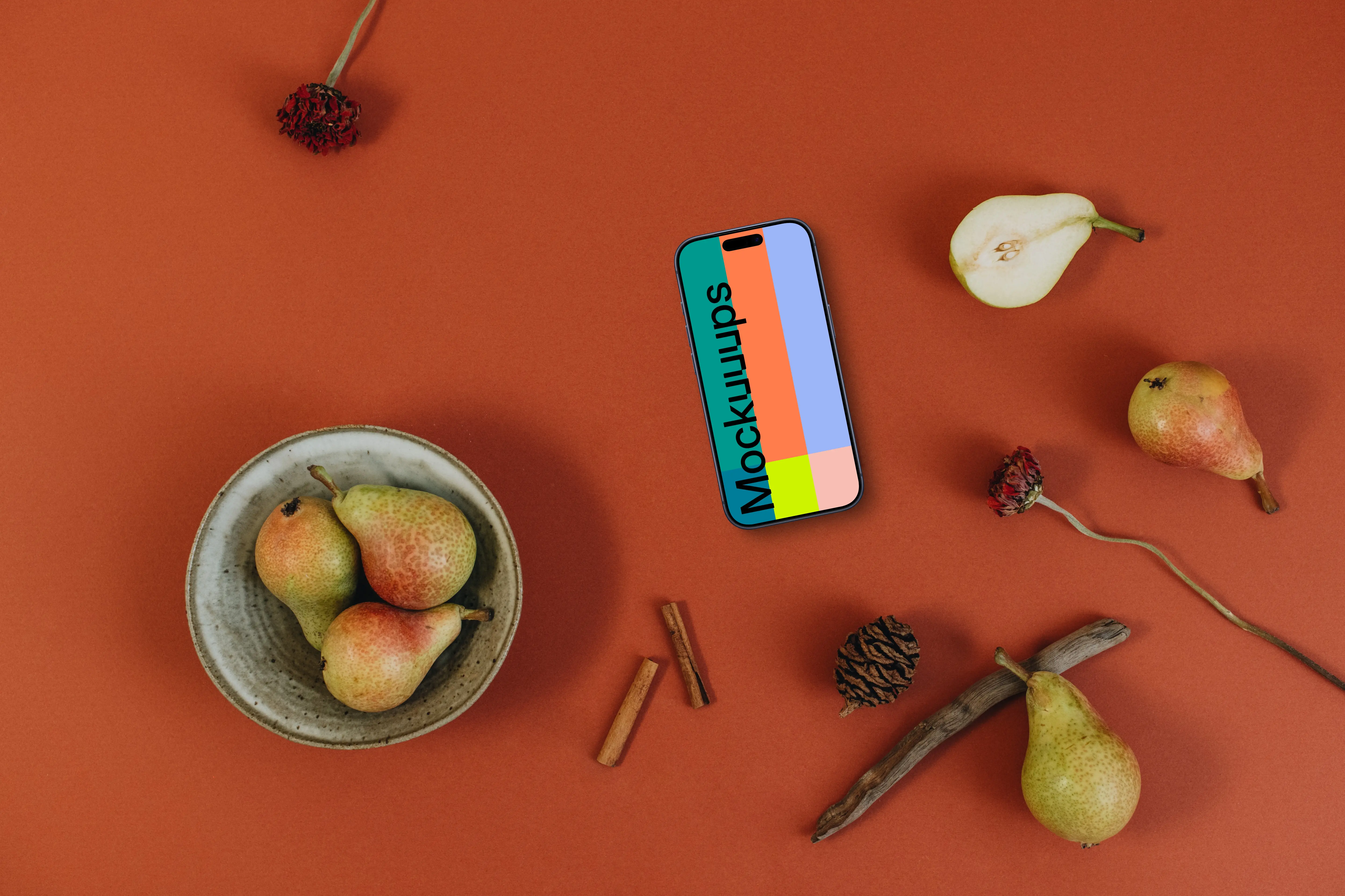 Top view of phone mockup on the dark orange background