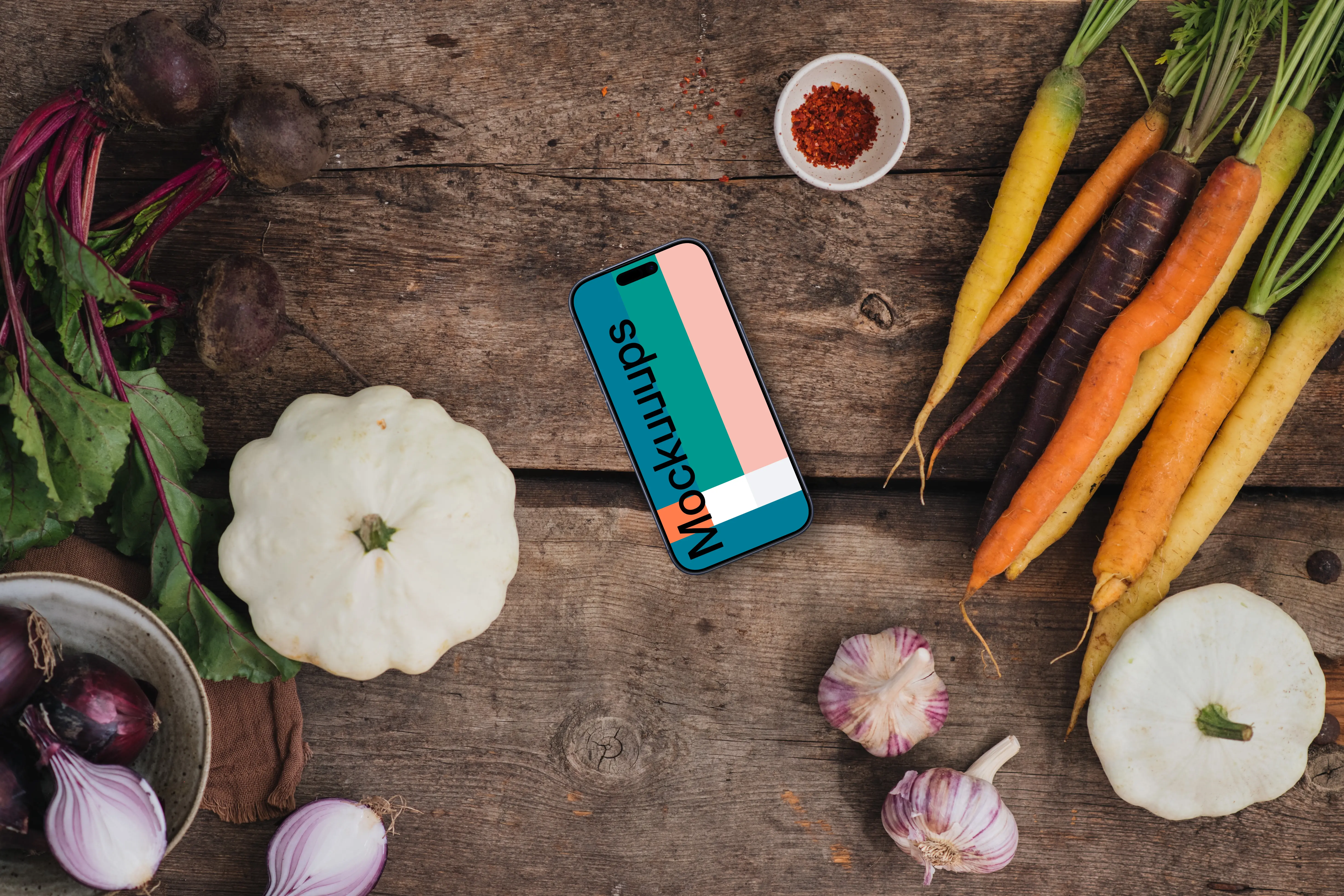 Top view of phone mockup on the wooden table