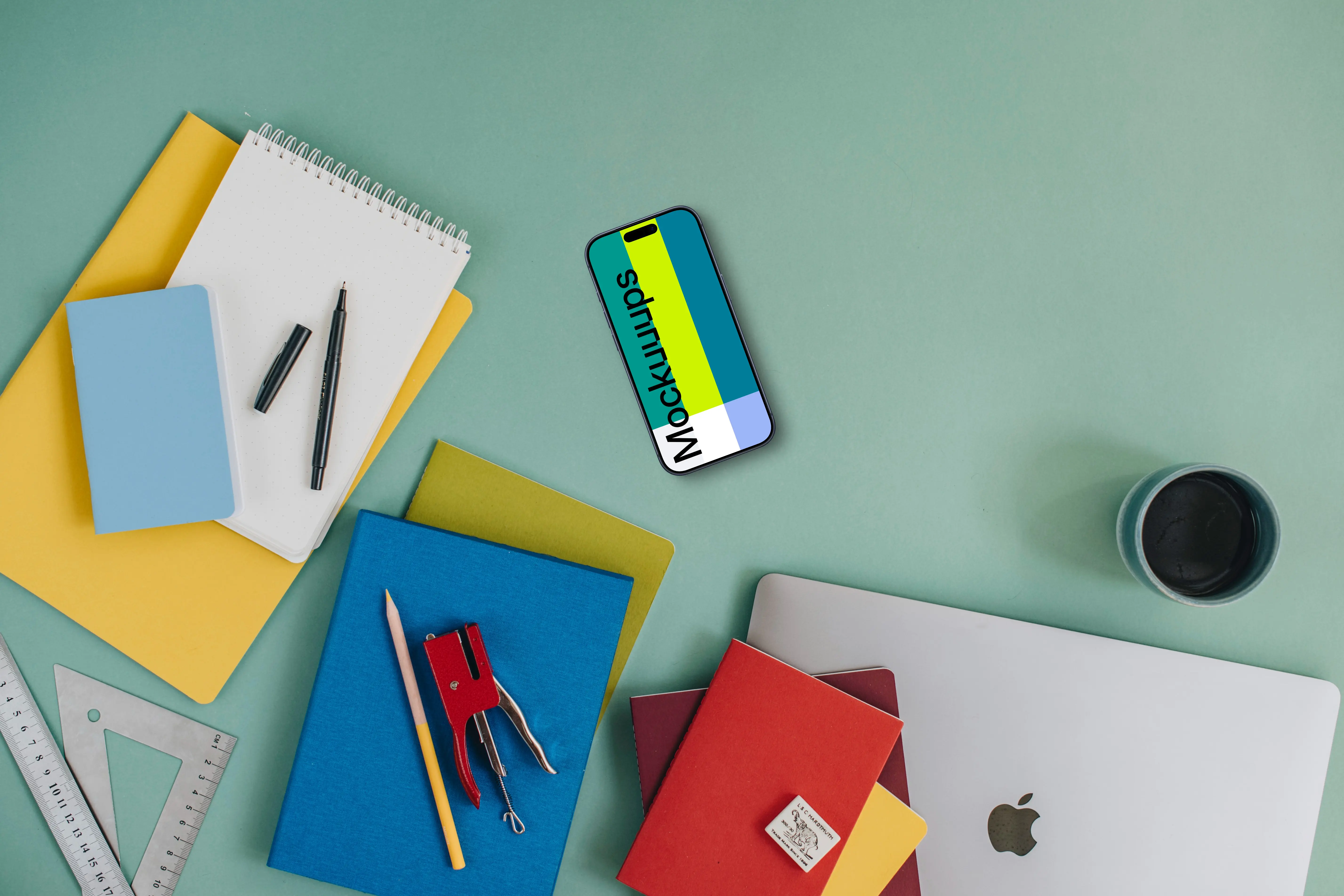 Top view of phone mockup with back to school elements