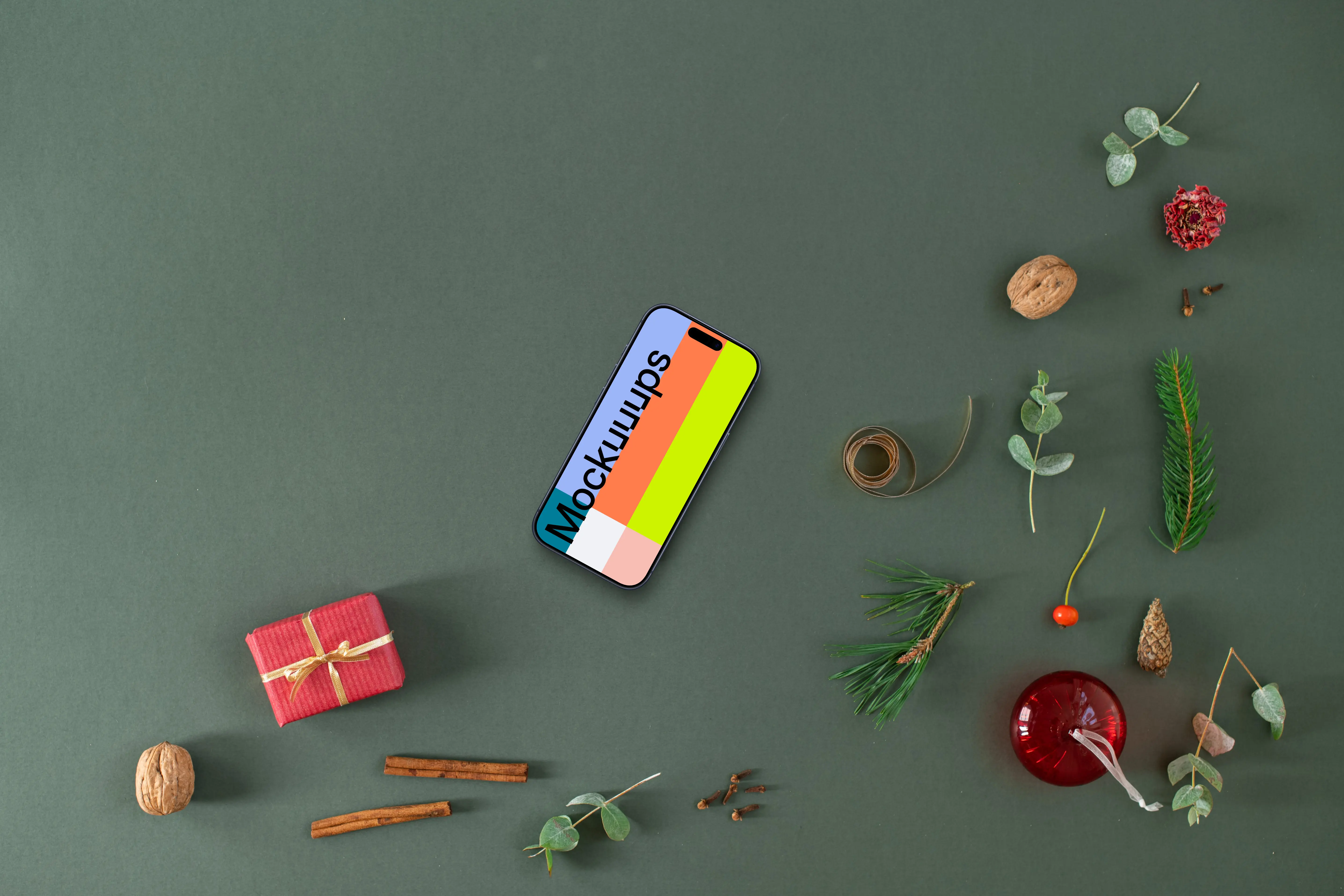 Top view of phone mockup with christmas background