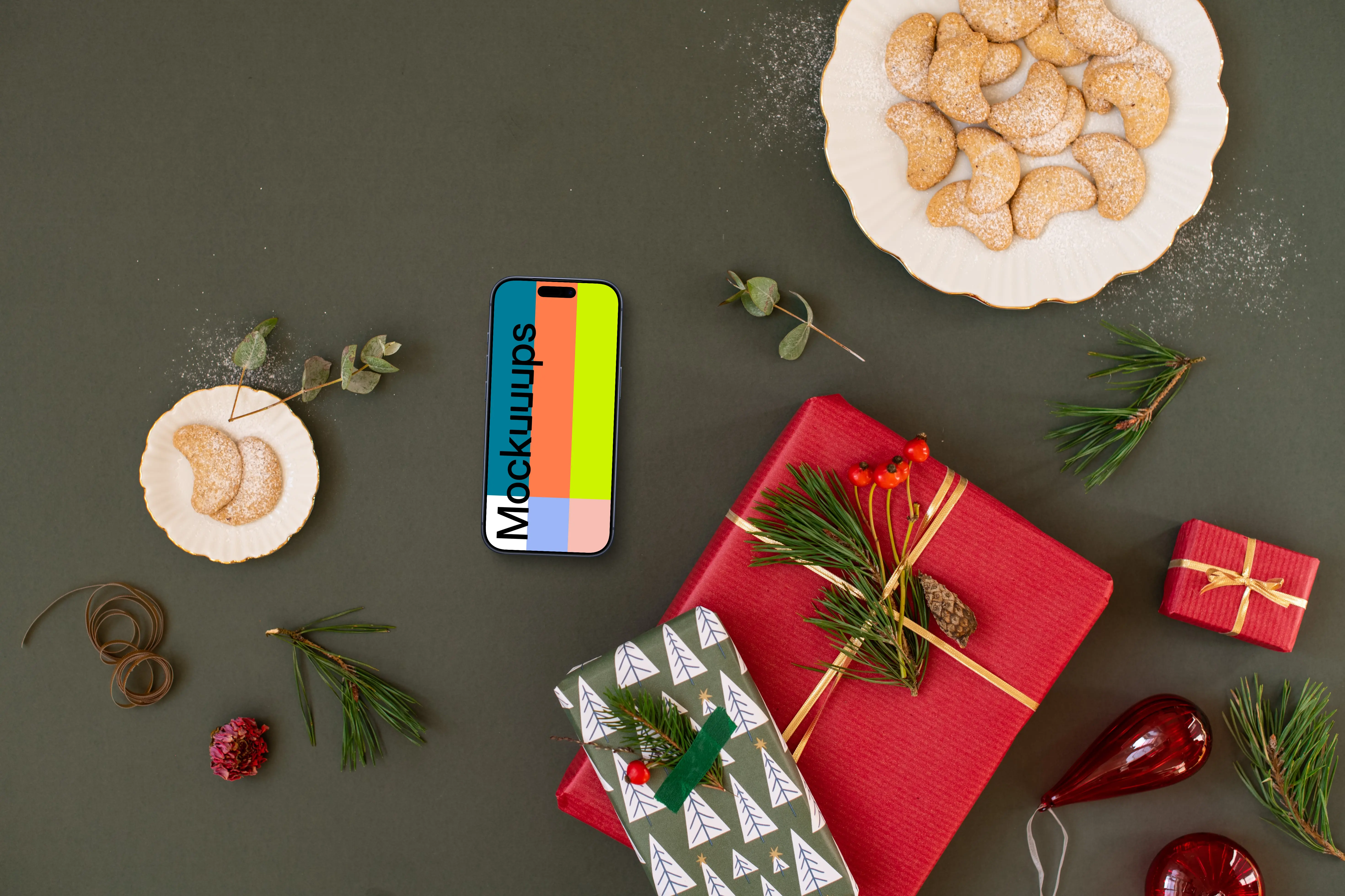 Top view of phone mockup with christmas decoration