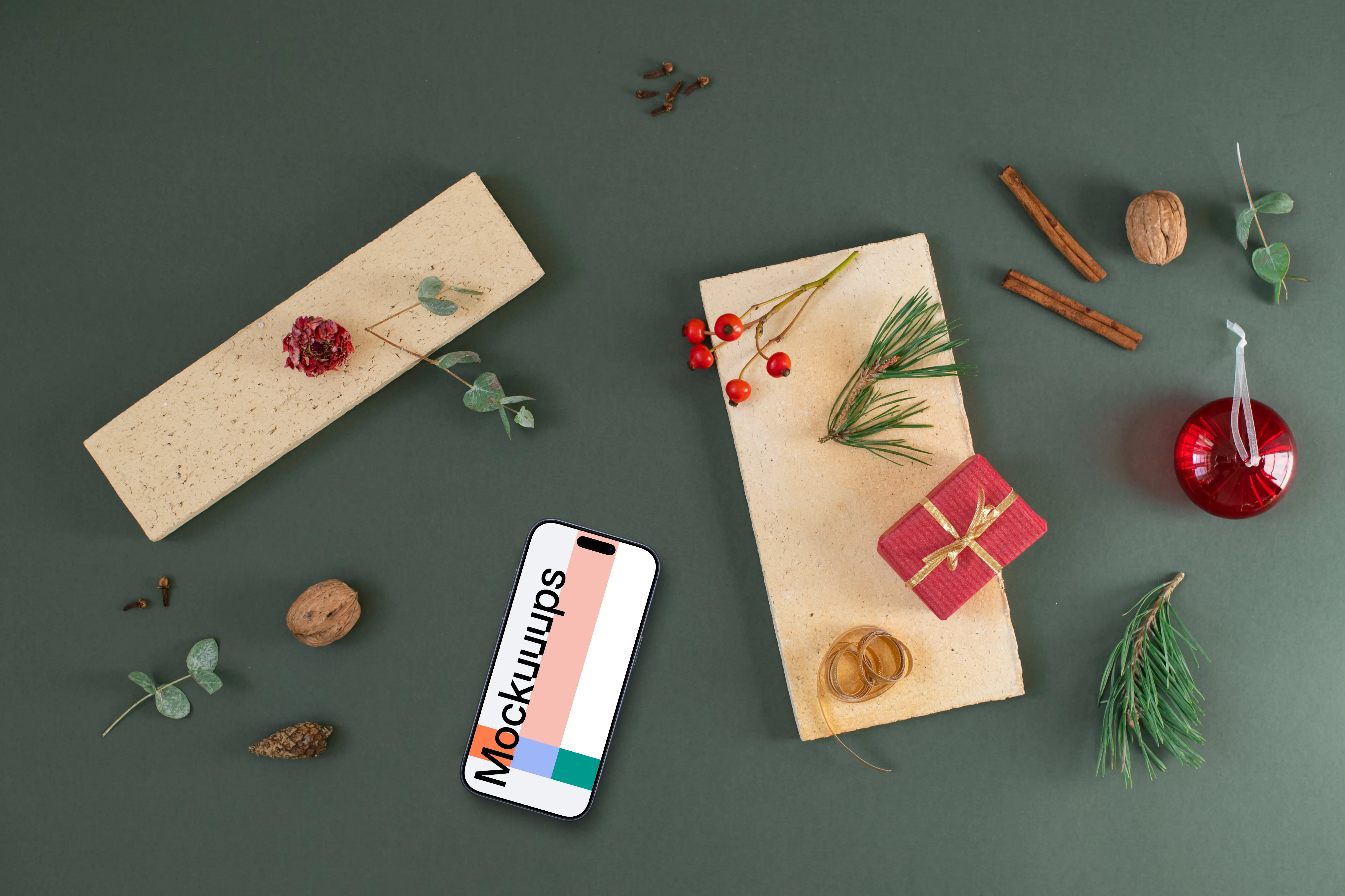 Top view of smartphone mockup with christmas decoration