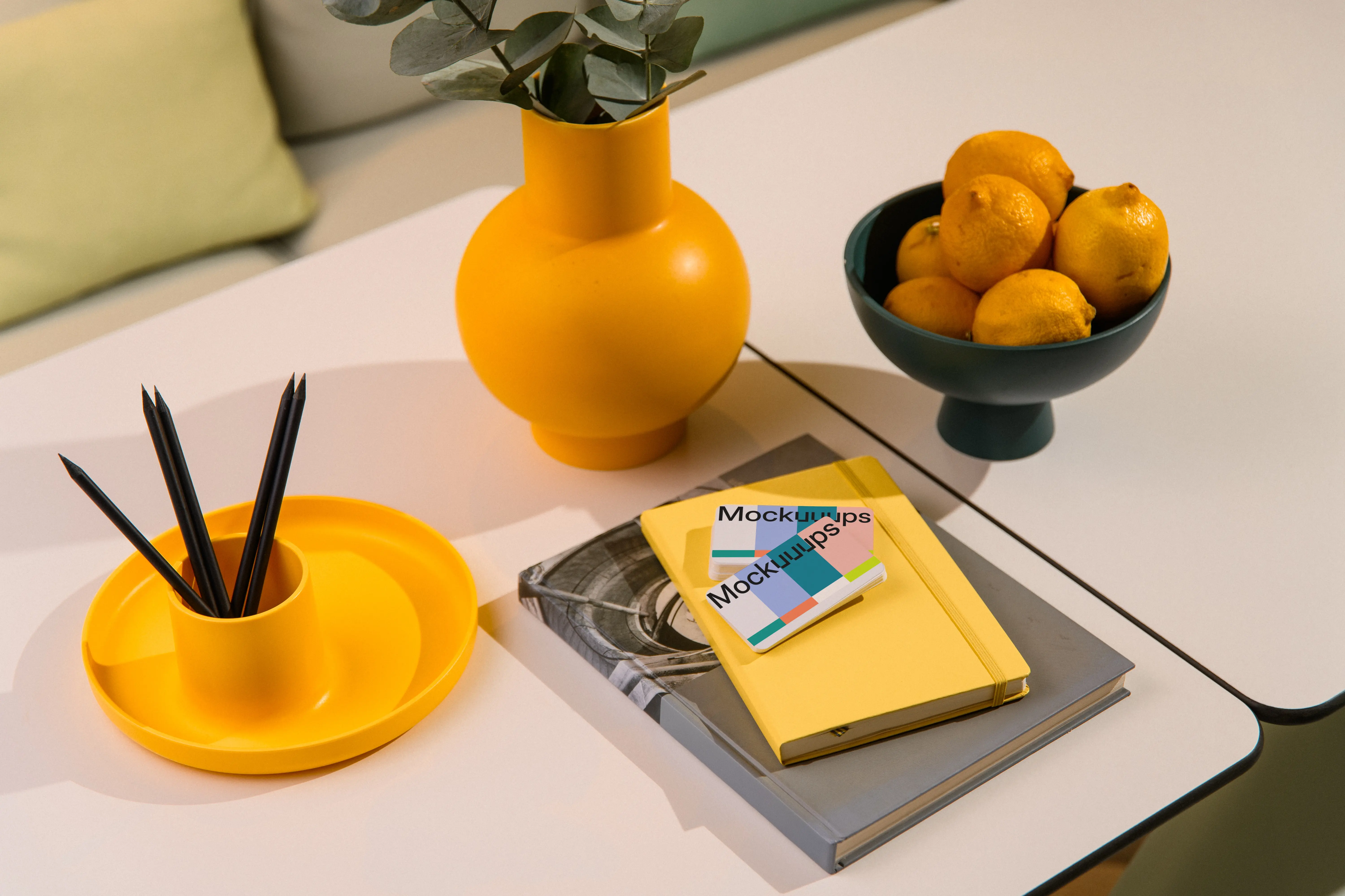 Two business cards mockup on a modern tabletop scene