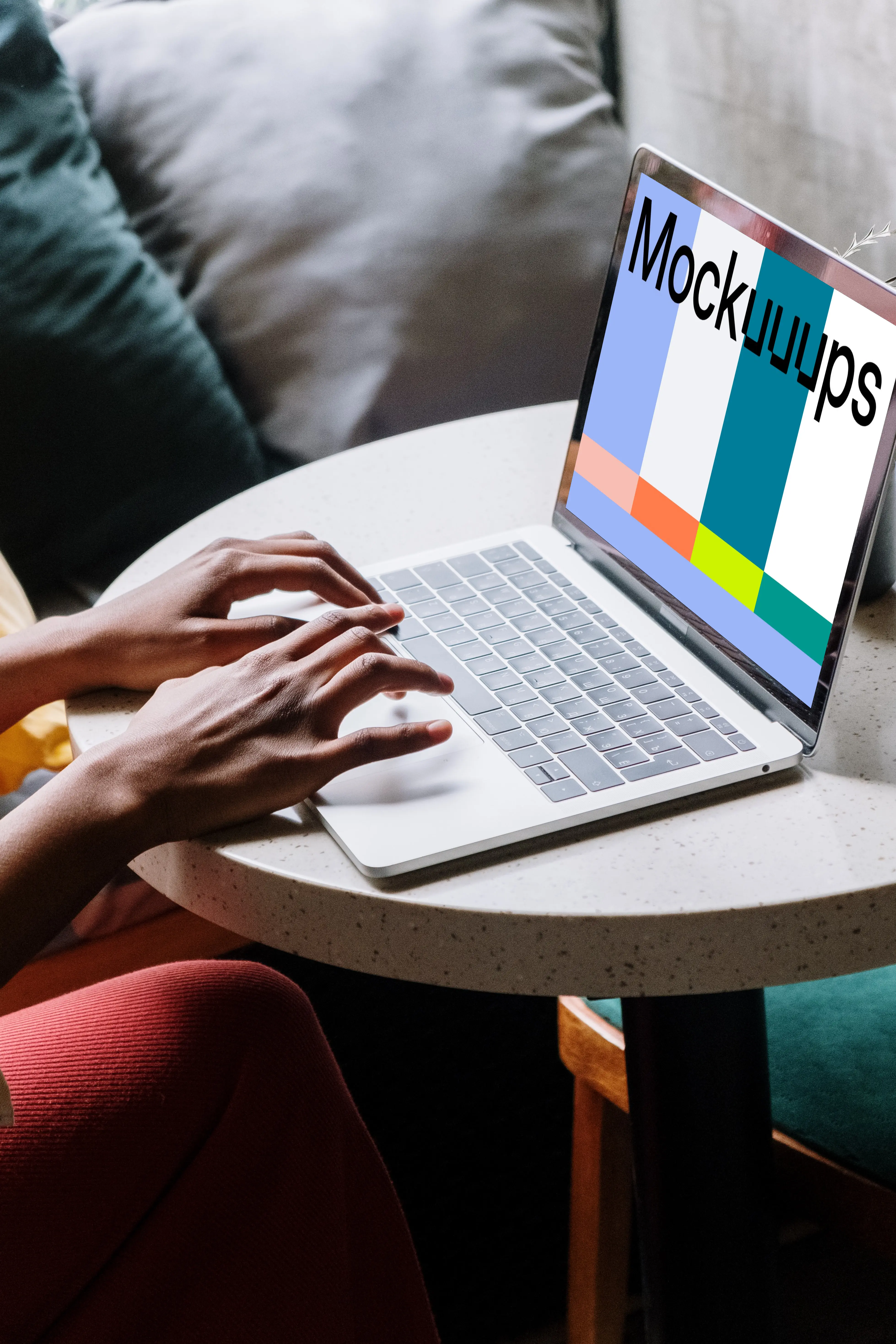 White MacBook Pro mockup on table