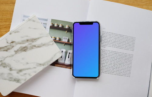 iPhone 12 Pro mockup on a magazine