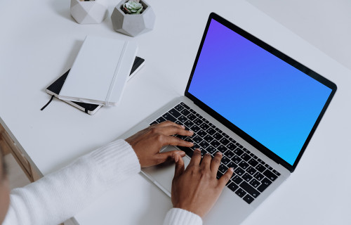 MacBook Pro mockup on a white table