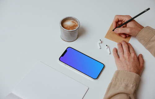 Simple iPhone mockup on a table beside a pair of Airpods