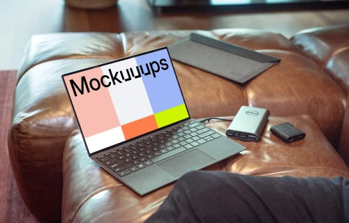 Dell XPS mockup on sofa with charger
