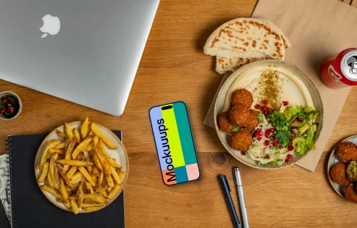 Bowl of hummus next to the Smartphone mockup