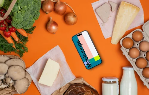 Device mockup in the middle of fresh groceries