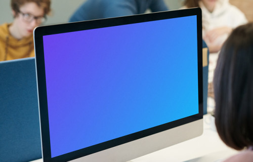 iMac mockup on a table in an office