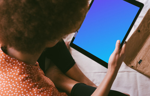 iPad Pro mockup in a lady's hand