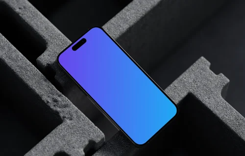 iPhone 16 mockup placed on concrete blocks