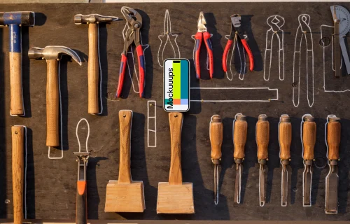 iPhone mockup on a wall with tools