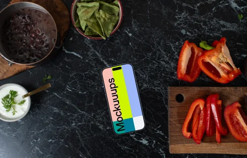 iPhone mockup on the marble kitchen unit