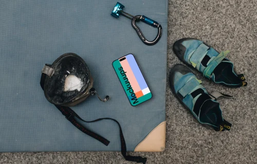 iPhone mockup with climbing equipment
