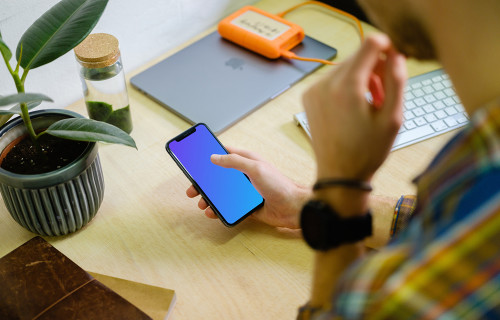 Man browsing on the iPhone 11 mockup