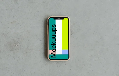 Minimal iPhone 12 mockup on grey surface