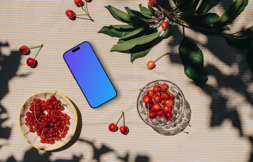Phone mockup with a fresh fruit on the table