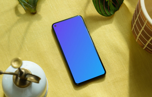 Pixel 5 mockup on a yellow table