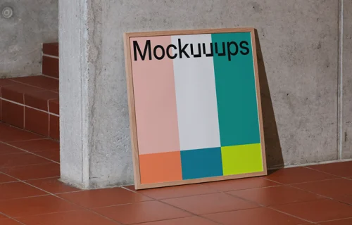 Poster mockup against a concrete wall with tiled floor