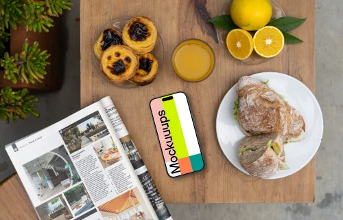 Smartphone mockup in a cafe with sandwiches