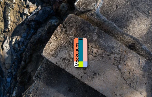 Smartphone mockup on a rocky surface