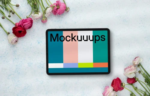 Tablet mockup surrounded by flowers